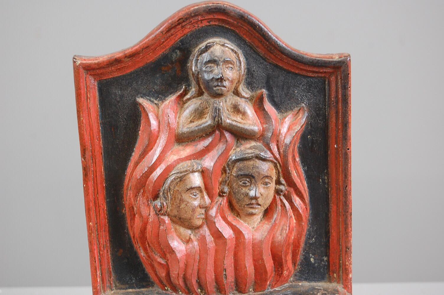 Late 18th-early 19th century offertory collection box, depicting souls in purgatory with the saviour in prayer above. Relief carved original polychrome finish. Locking drawer (replacement lock), as expected wear and damage. An interesting way of