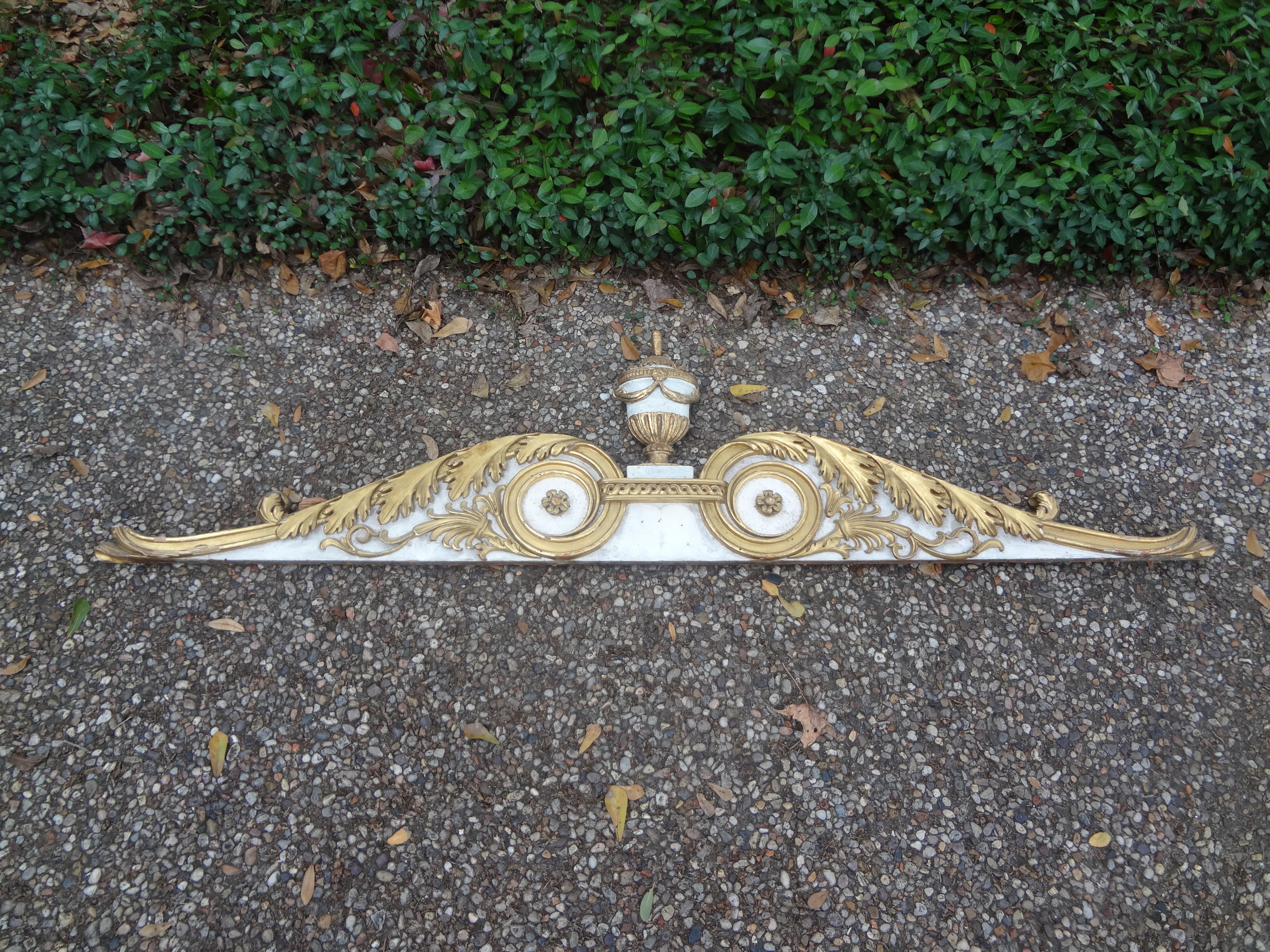 Stunning late 18th-early 19th century Italian painted and parcel carved giltwood architectural over door, architectural element or fragment. A great decorative piece with beautiful patina!.