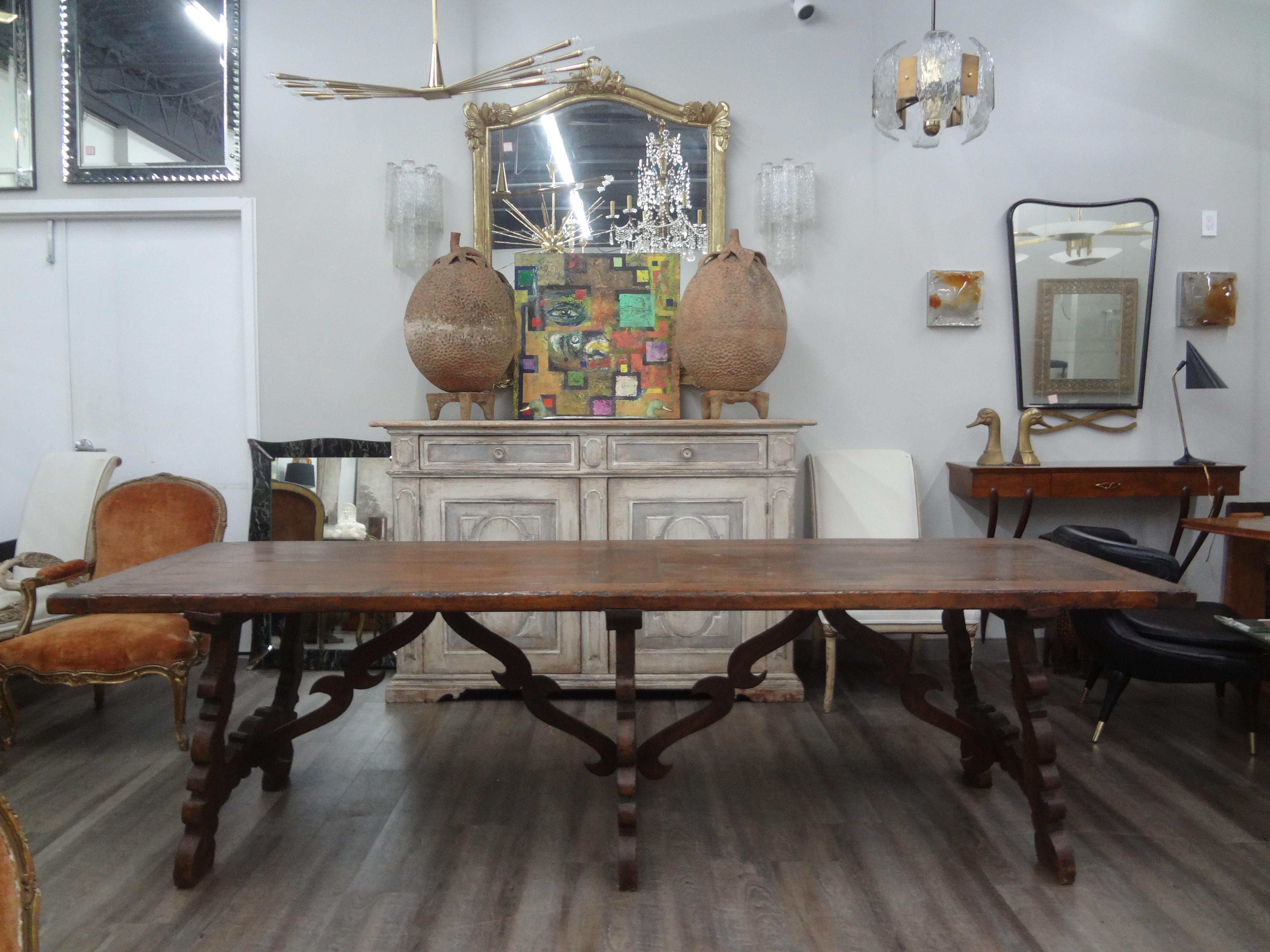 Late 18th-Early 19th century Italian Walnut Dining Table.
We offer a magnificent antique Tuscan walnut dining table which can be used as an entrance table, trestle table, refectory table or console table.
This outstanding Italian Baroque table has a