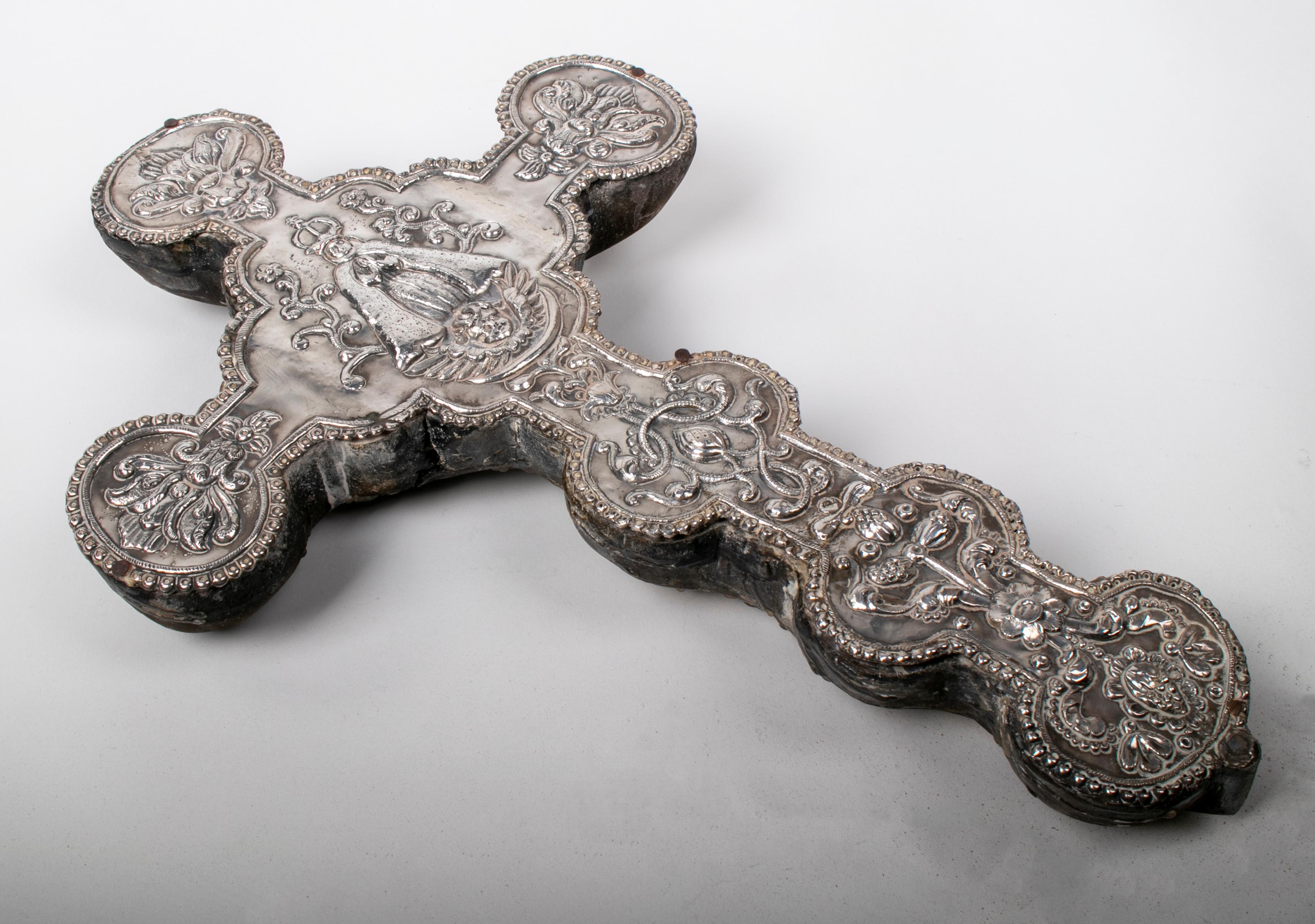 Late 18th-early 19th century Peruvian silver cross on wood.
