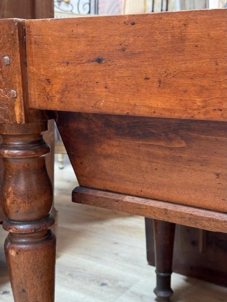 19th Century Late 18th-early 19th French Provincial walnut dough table For Sale