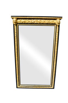Espejo de madera ebonizada y dorada Napoleón III francés de mediados/finales del siglo XIX