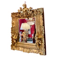 Specchio con cornice in legno dorato e gesso della fine del XIX secolo in stile rococò Napoleone III