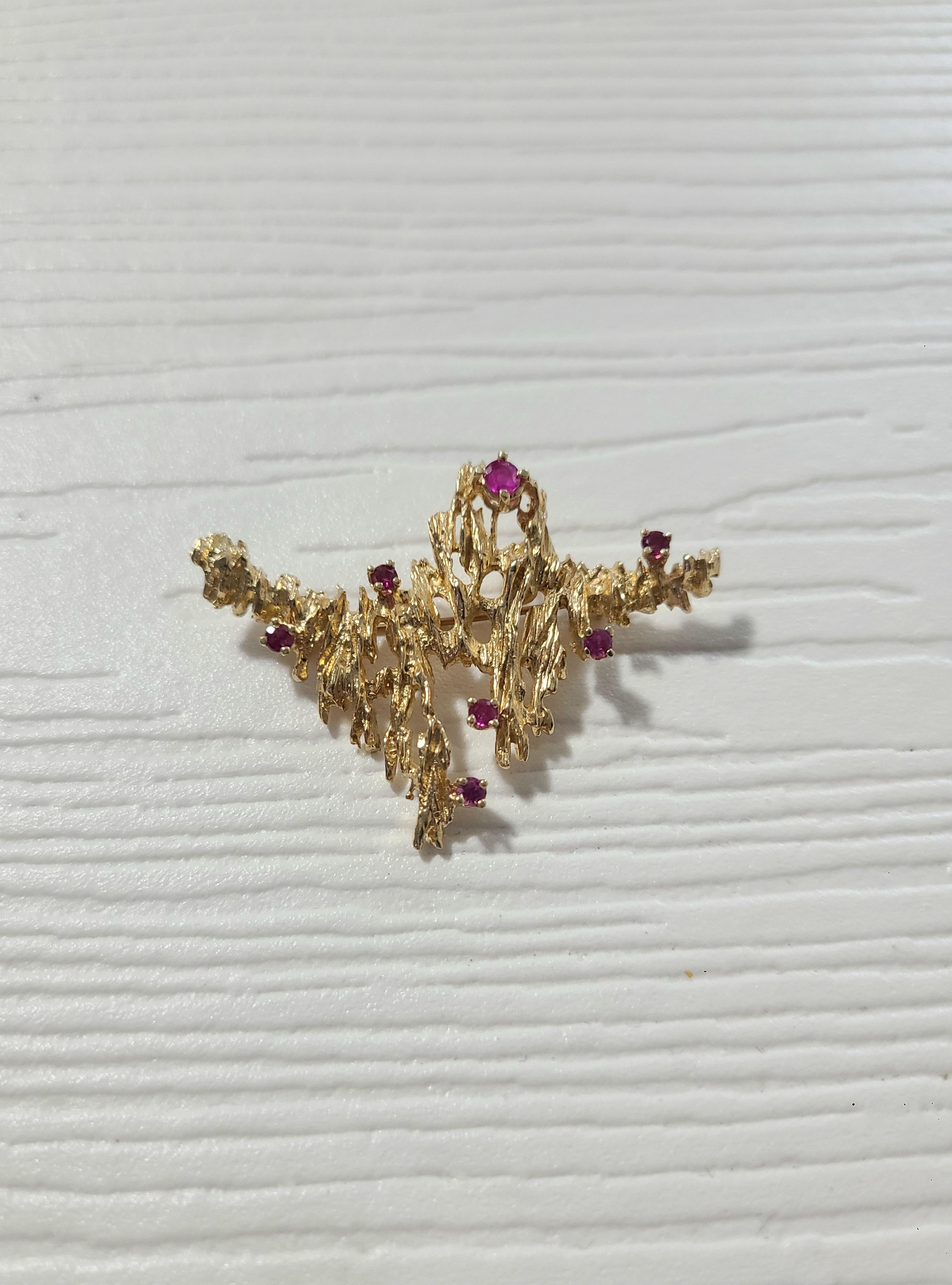 Bruatlist jewelery design is fully embodied in this 14k gold and ruby brooch, meticulously crafted by Walter Schleup in his Montreal studio. 

