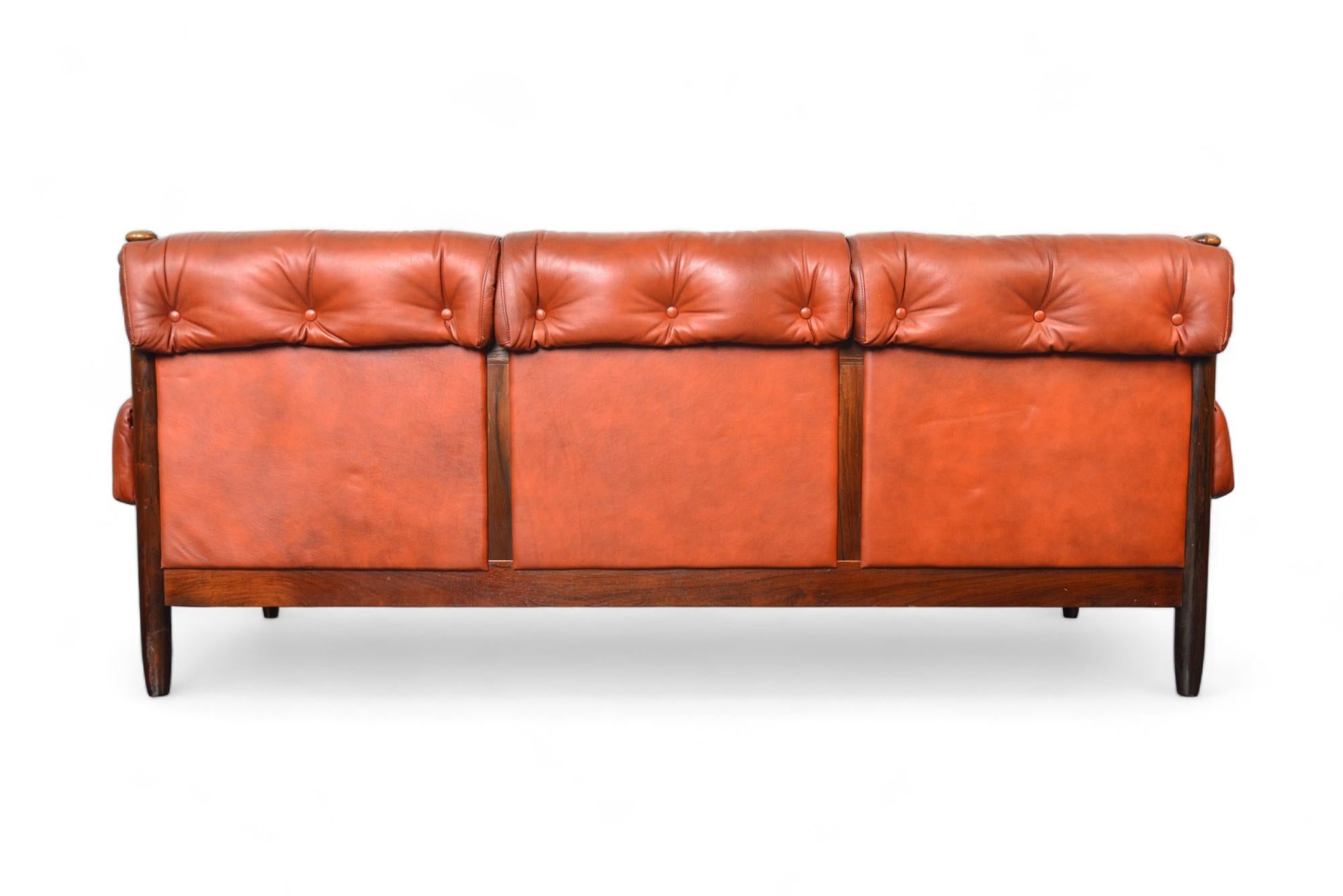 Late 1960s Danish Solid Rosewood + Rust Leather Three Seat Sofa For Sale 4