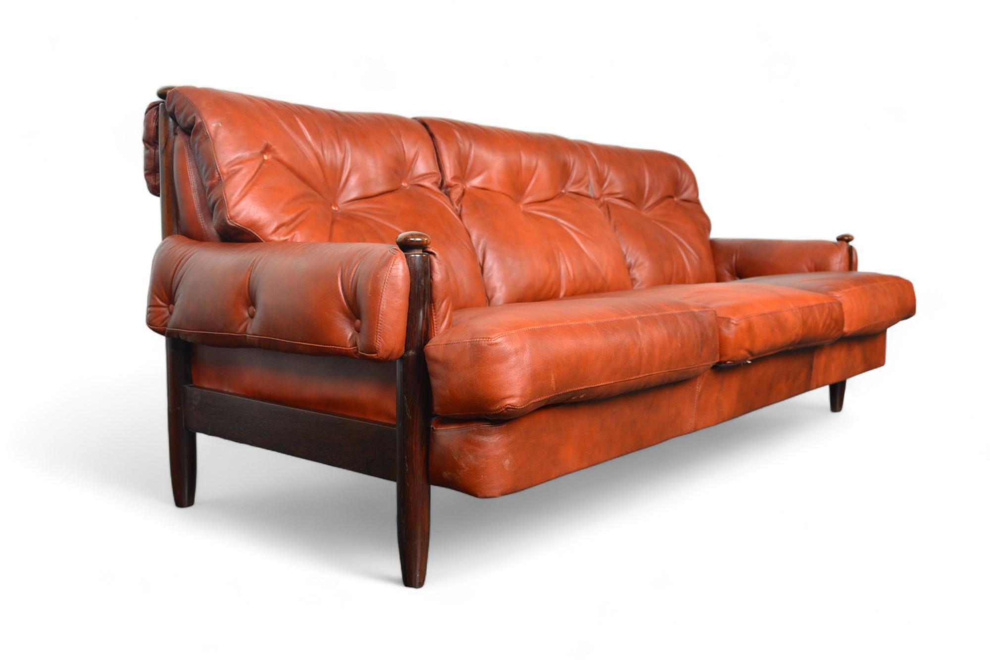 German Late 1960s Danish Solid Rosewood + Rust Leather Three Seat Sofa