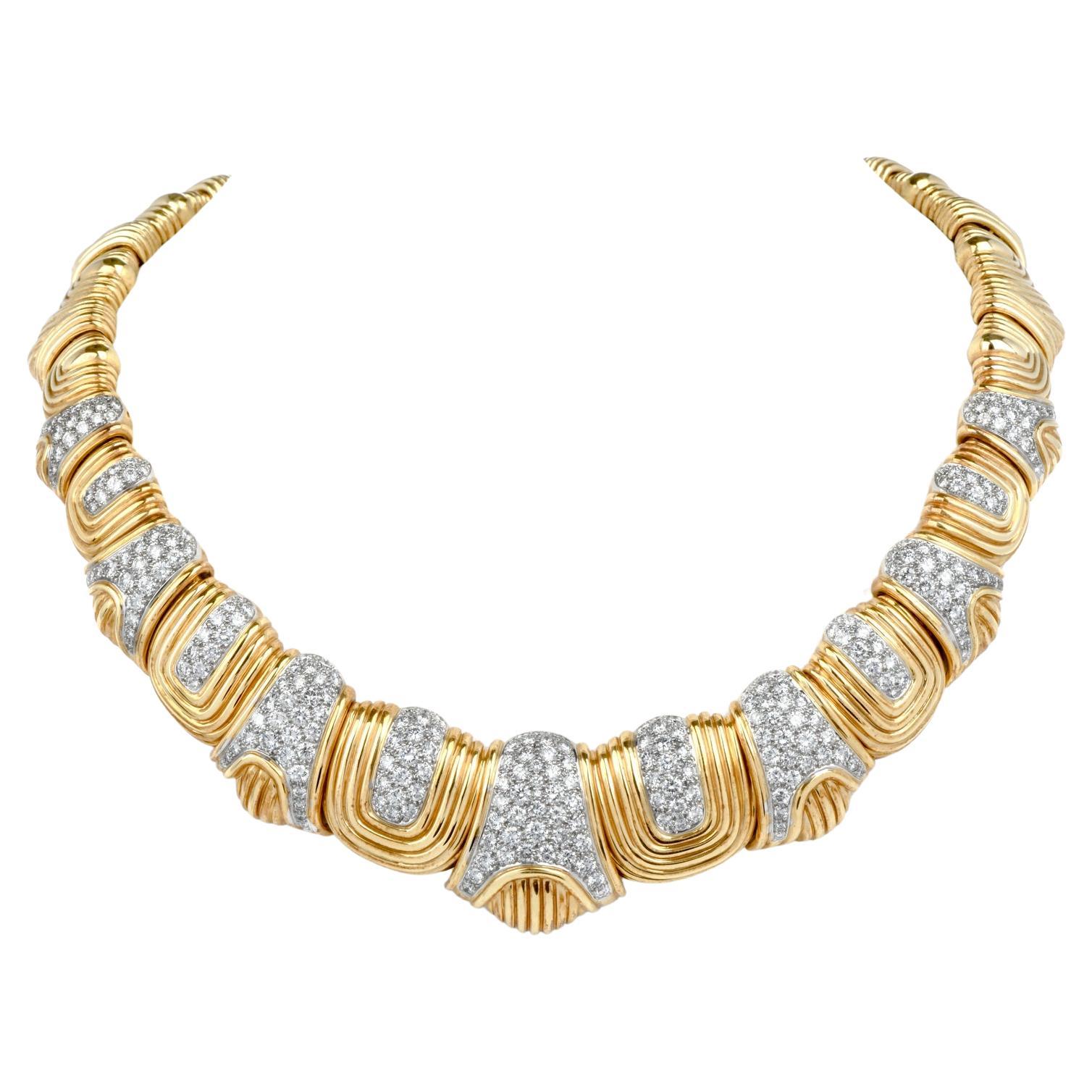 Feel gorgeous in this impressive Vintage early 1980s Diamond 18K Yellow Gold Platinum Link Collar Necklace.

A channeled design graciously added to the gold link, will adorn the collar bone of the wearer.

This exquisite necklace weighs an