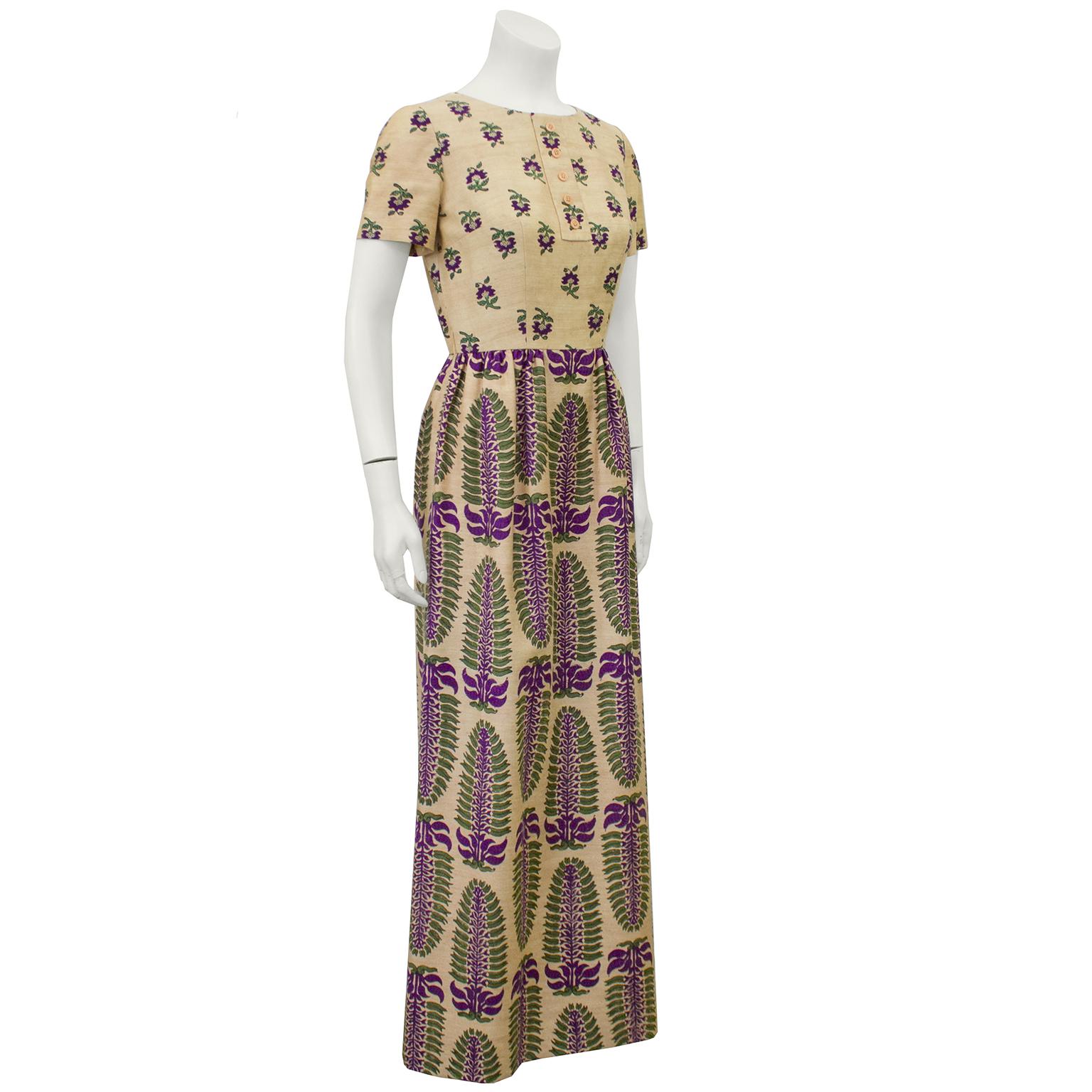 Inspired by the Thai silk from the far east, this late 1970s Lanvin dress and jacket ensemble is made from a beautiful beige shantung silk and is printed in the Bagh style throughout in violet and green floral pattern. The dress has short sleeves