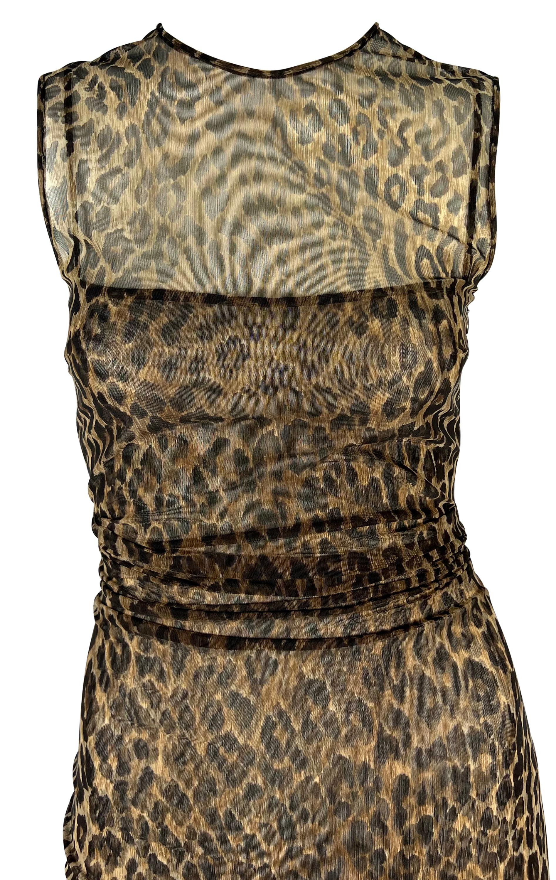 From the late 1990s, this sheer Dolce & Gabbana cheetah print dress clings to the body. The stretch mesh dress is covered in a bold cheetah print and features two layers: an interior slip and an exterior sleeveless design. This enticing dress falls