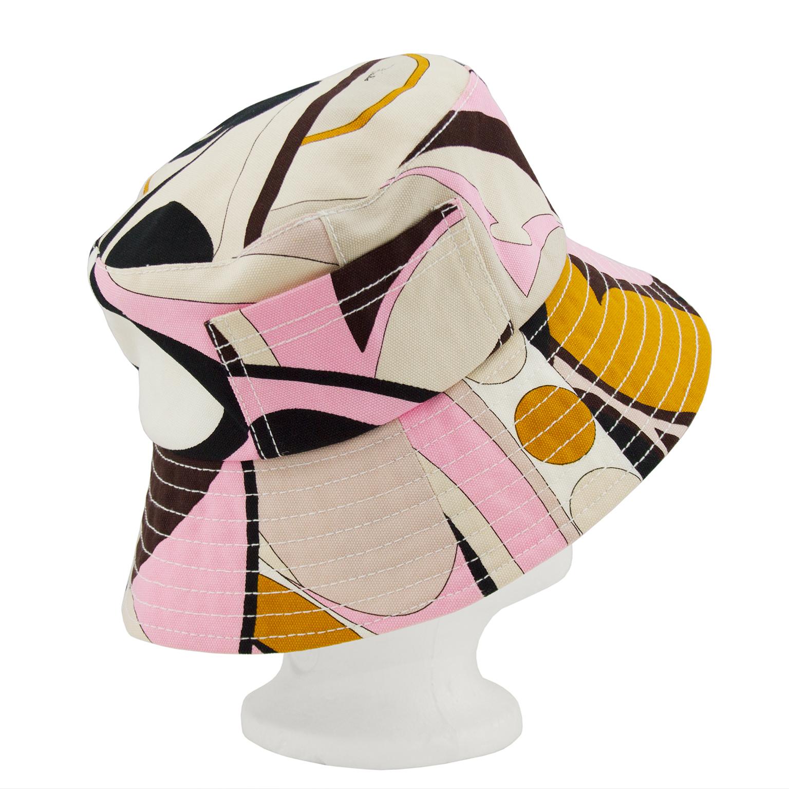 Emilio Pucci brown, pink, beige and yellow abstract printed canvas bucket hat from the late 1990s, early 2000s. A snug fit with a white interior and cream stitching along the brim. In excellent condition, one pocket on the exterior, perfect for a