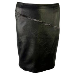 Late 1990s Gianni Versace Black Leather Silver Chain Accent Mini Skirt