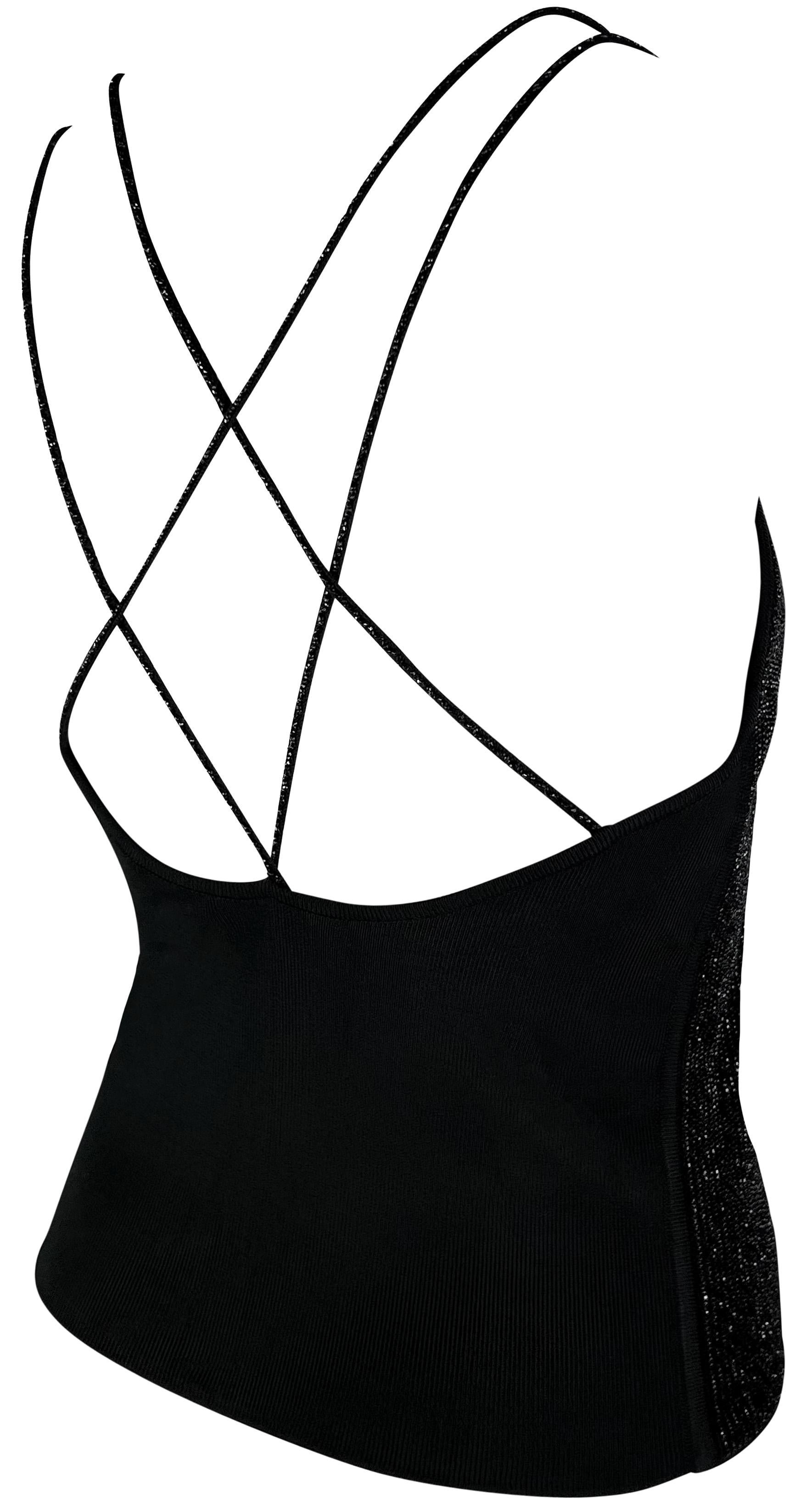 This fabulous 1990s black Giorgio Armani tank top is covered in thousands of shiny black beads. The top features two shoulder straps on either side that cross over a semi-exposed back. The perfect elevated essential, this vintage Giorgio Armani tank