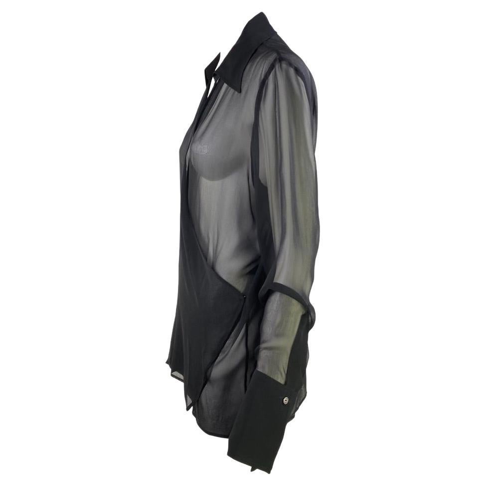 Presenting a sheer wrap Gucci tunic blouse designed by Tom Ford. This simple yet sexy top features a collar, plunging v-neckline, and bell cuffs. Since the late 1990s, this top has been versatile and easily dressed up or down or used as a pool