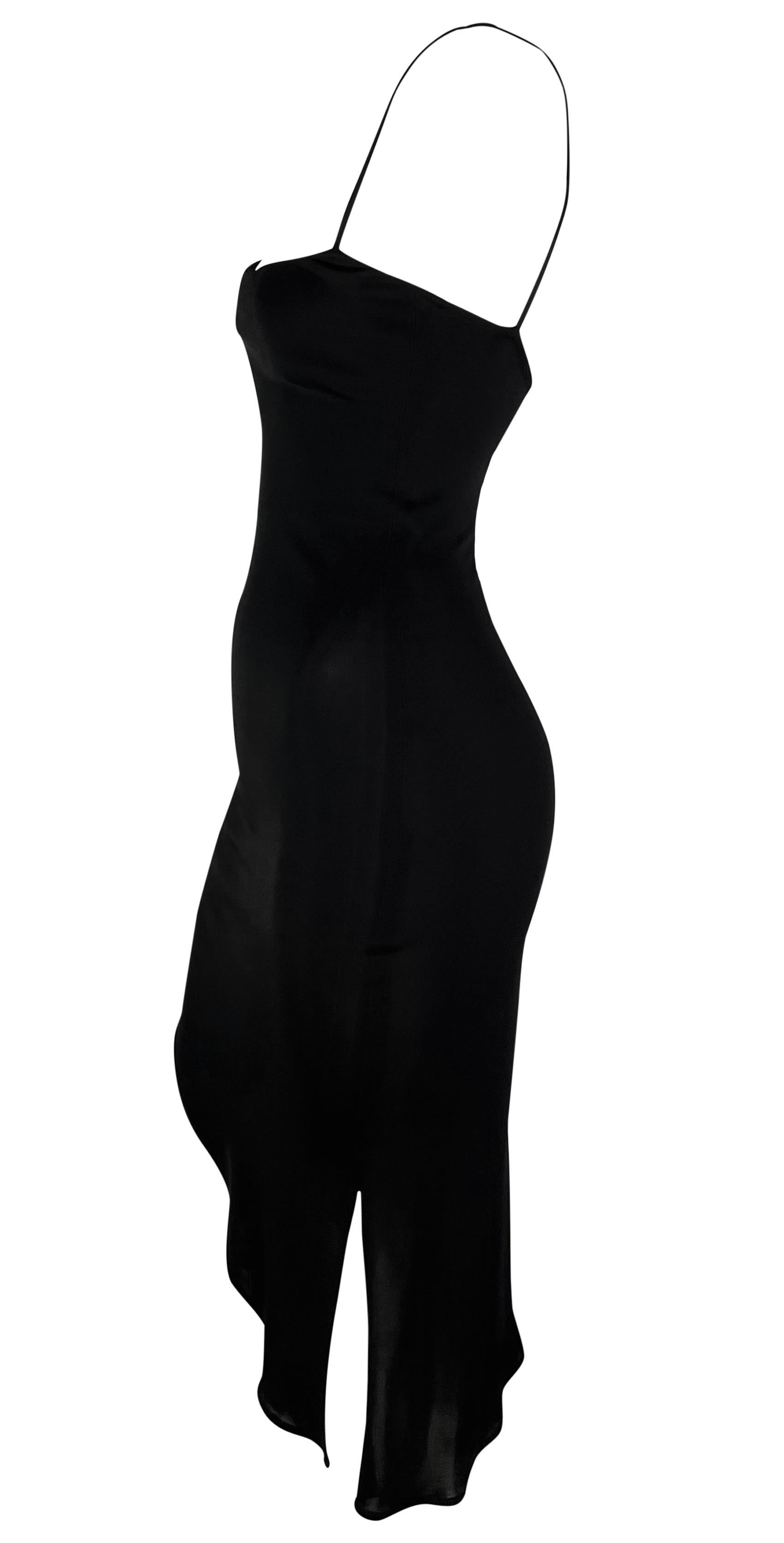 From the early 2000s, this slinky black asymmetric slip dress by Yigal Azrouel embodies the quintessential sexy little black dress for a night out. The slip-style design includes delicate spaghetti straps, a chic square neckline, and an asymmetric