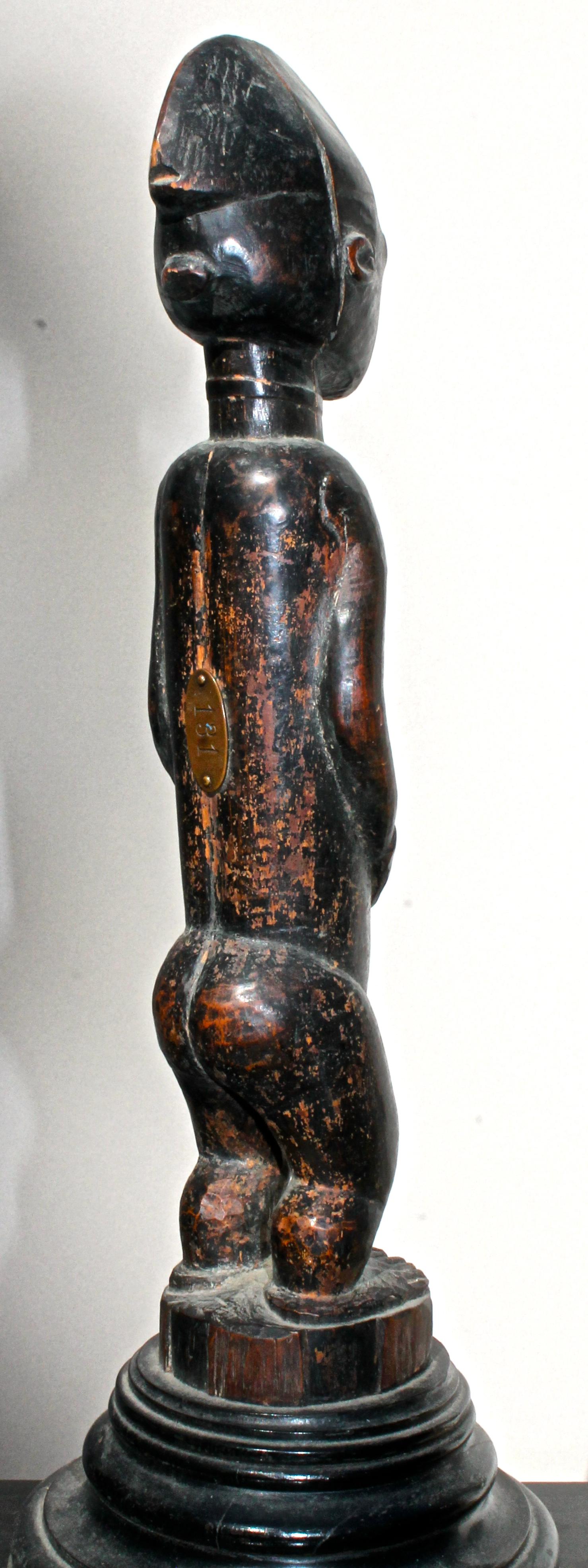 Carved Late 19 Century Tribal Baule Male Figure with Period Mount African Art For Sale