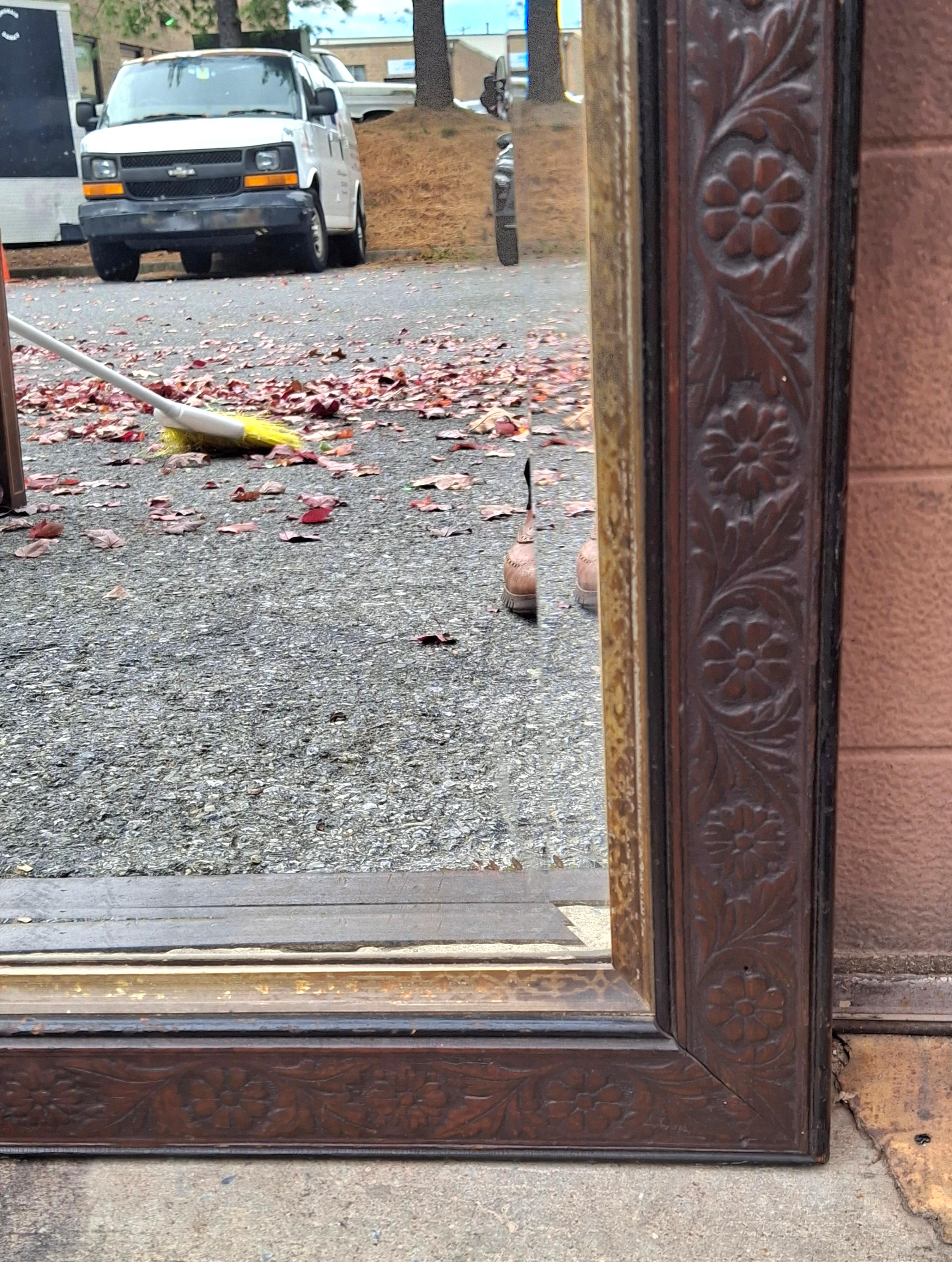 Baroque Revival Late 19th C. Aesthetic Movement Carved Mahogany and Parcel Gilt Frame Mirror For Sale