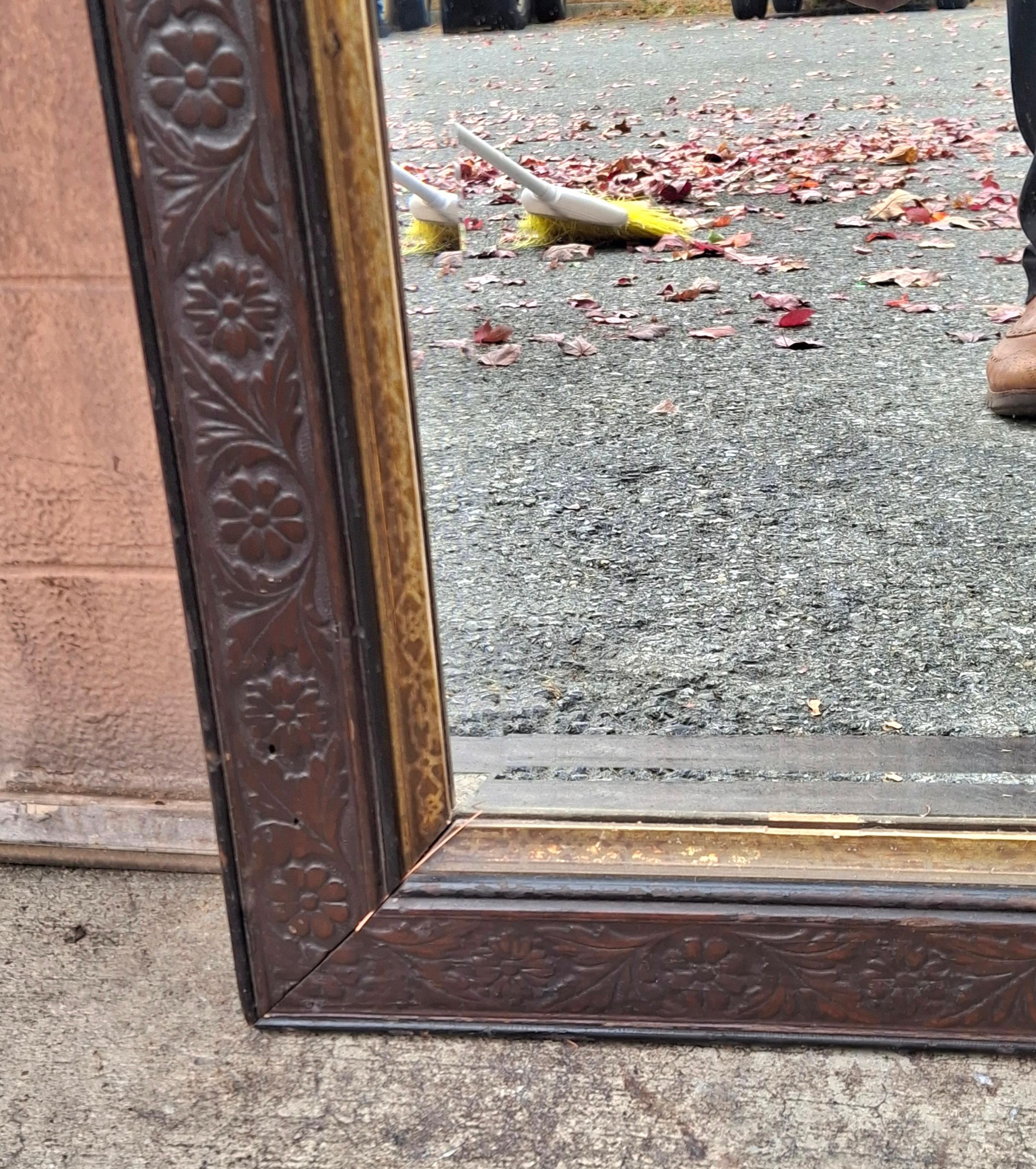 American Late 19th C. Aesthetic Movement Carved Mahogany and Parcel Gilt Frame Mirror For Sale