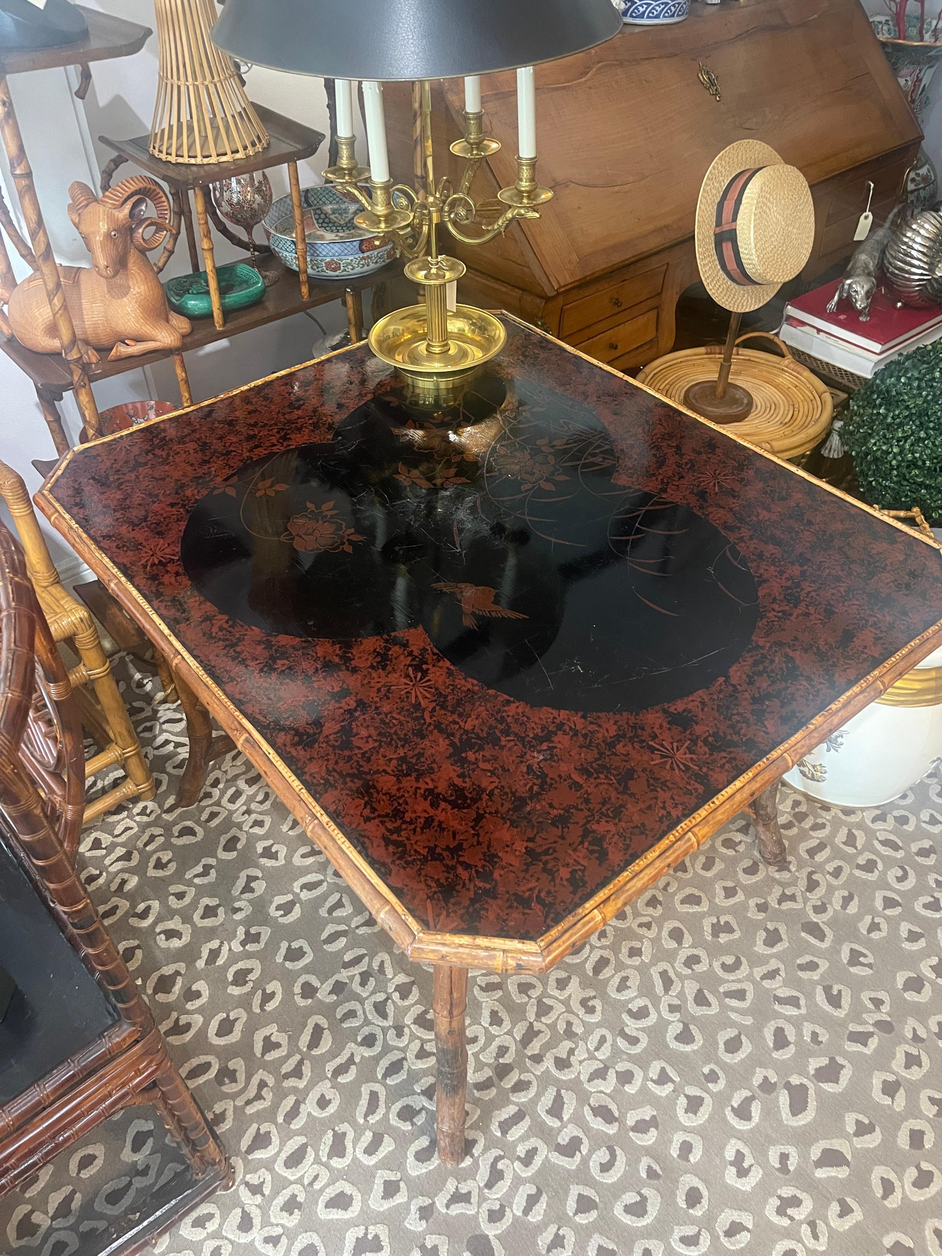 This is a fabulous example of  a rare Late 19Th C. Bamboo & Japanned Lacquer Table,.
This table was brought back from France.
Very unusual size, could be used as a dining table, game table arc...
the dimensions are: 29