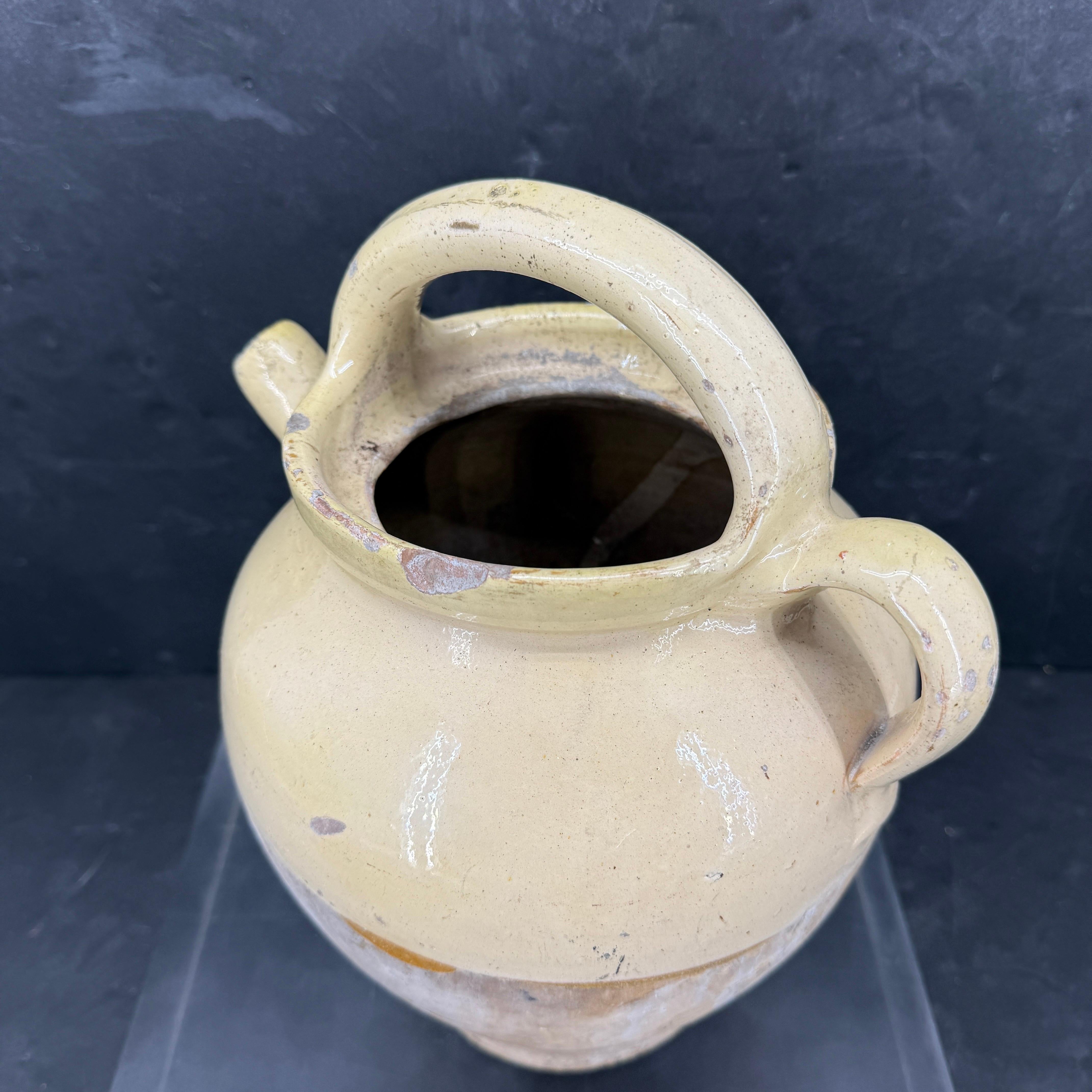 XIXe siècle A.C.I.C. Jauge à eau en céramique jaune avec anse en vente