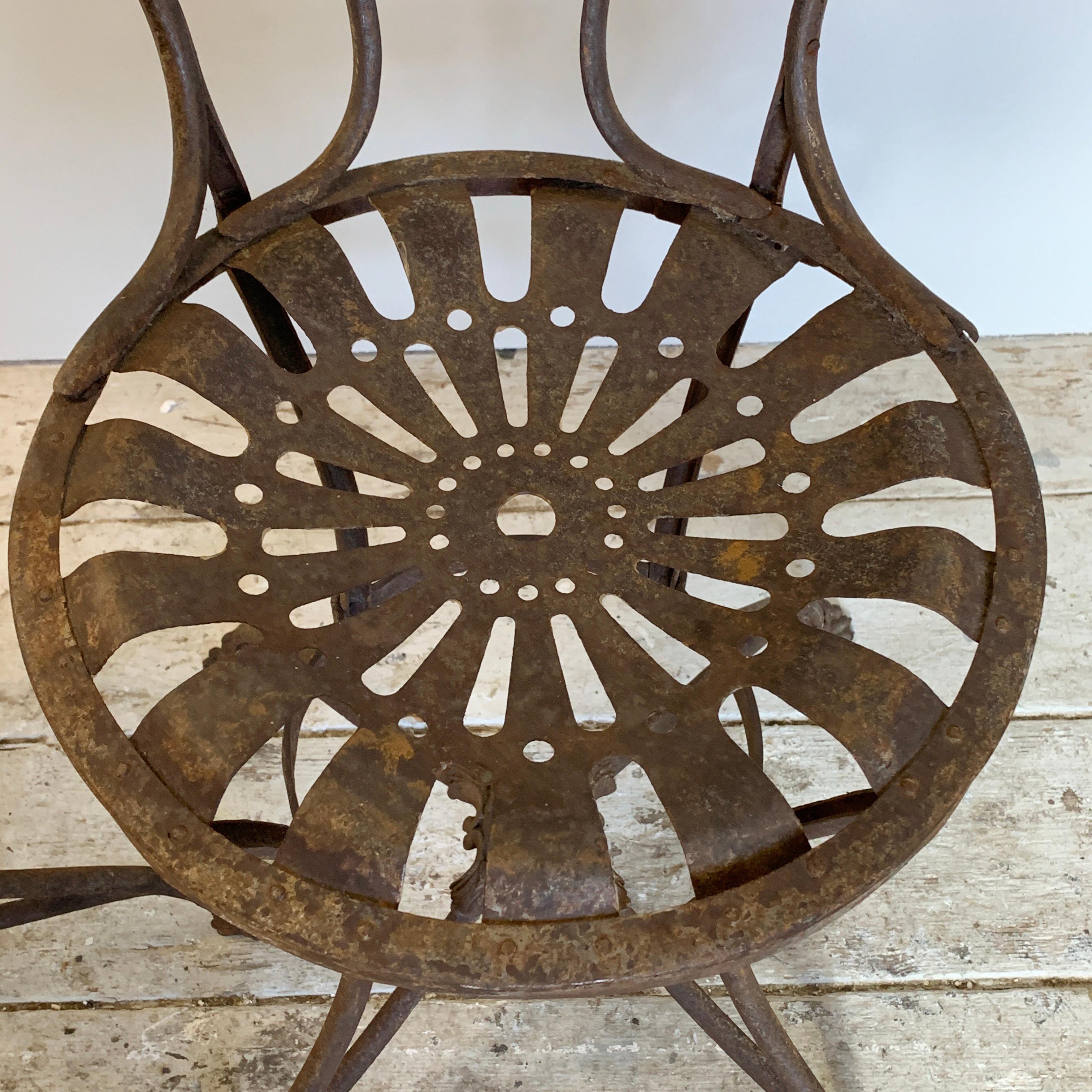 A rare pair of late 19th century French arras garden chairs
These chairs show the makers mark on the central casting between the legs, 'Grassin Brevete S.G.D.G arras'
The chairs are late 19th century, circa 1880s
They show the classic and