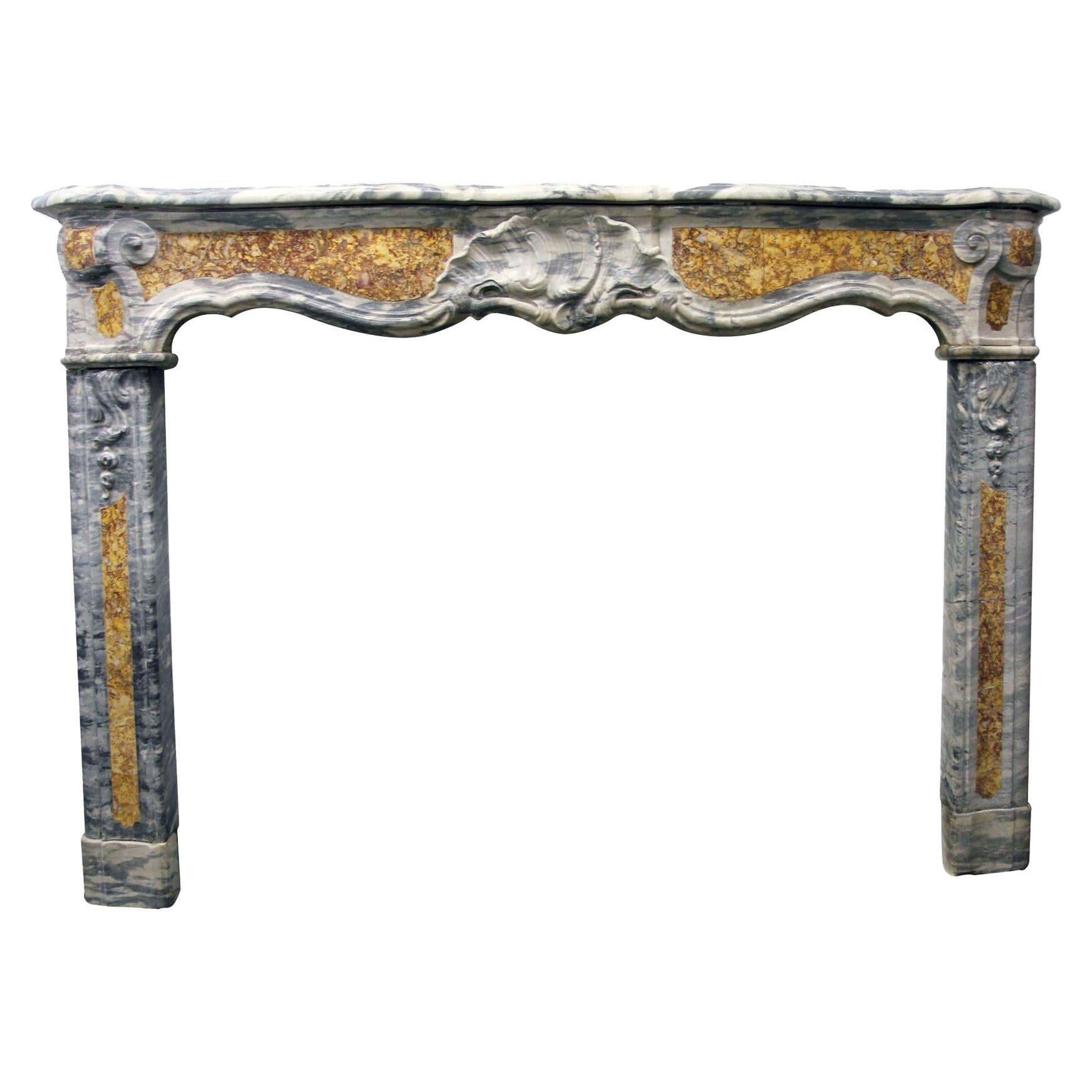 French Gray Marble Mantel Louis XV Hand Carved Pompadour Motif For Sale