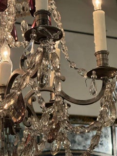 Fin du 19ème siècle. Lustre français en bronze argenté et cristal avec améthyste