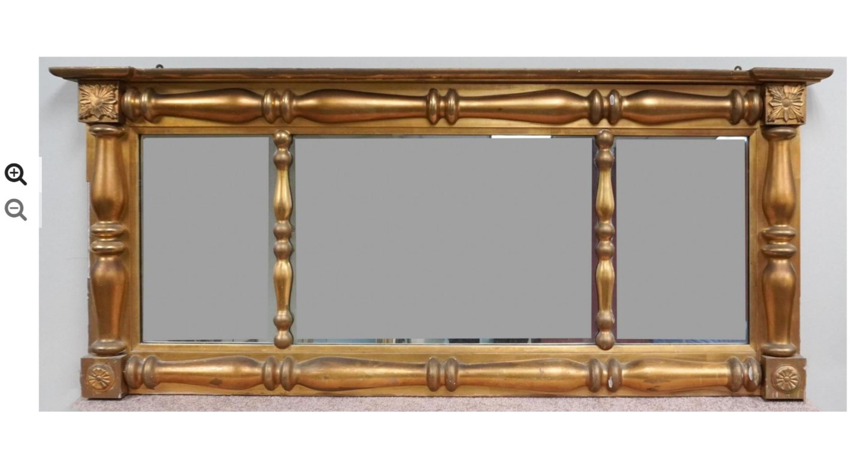 A large, Late 19th Century Georgian Style Gilt Decorated Large 3-panel Over Mantle Mirror.
Measures 62 inches in width, 27 inches in height and 4 inches in depth. 