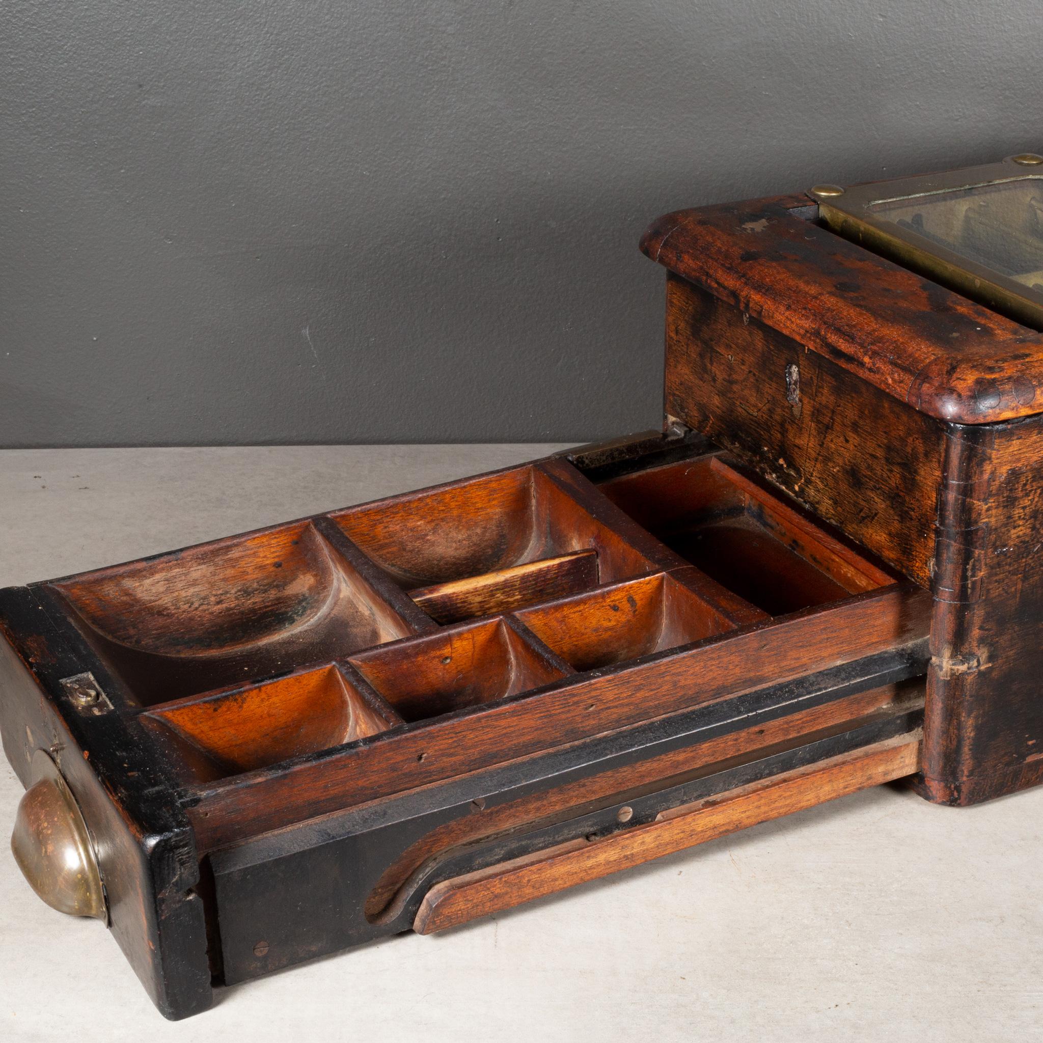 ABOUT

Antique O'Brien's self-closing cash till with original maker's plaque and seven sculpted money compartments. The solid Mahogany case is constructed with dovetail joints and has one large glass window and one smaller window both surrounded by