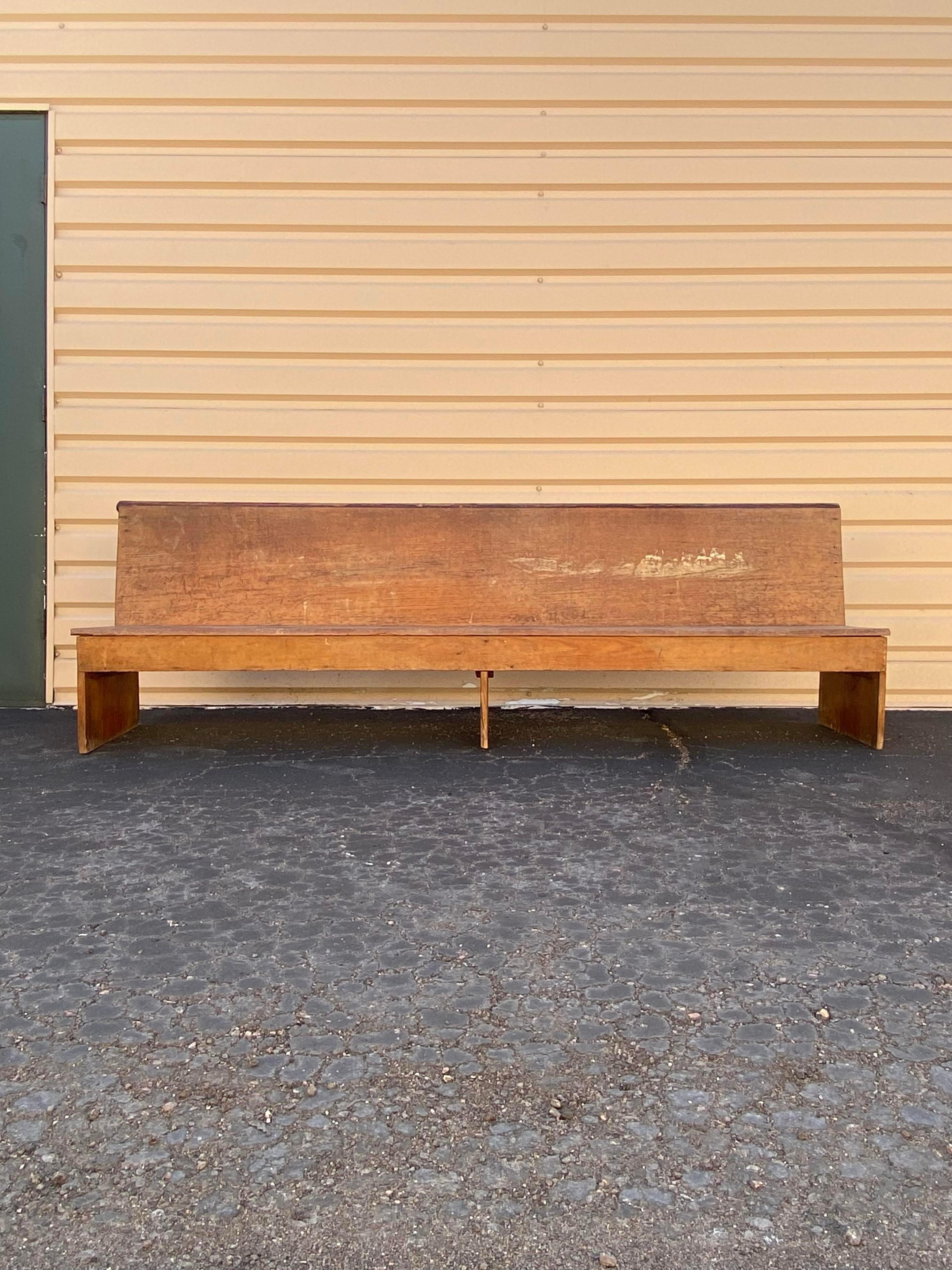 Mennonite bench which was in the same Colorado family since the early 1900s. A simple and sturdy piece, with original patina, a rare gem. A clean, Minimalist piece for seating or commercial display of books and objects.

89”W x 17”D x 28.13”H with a