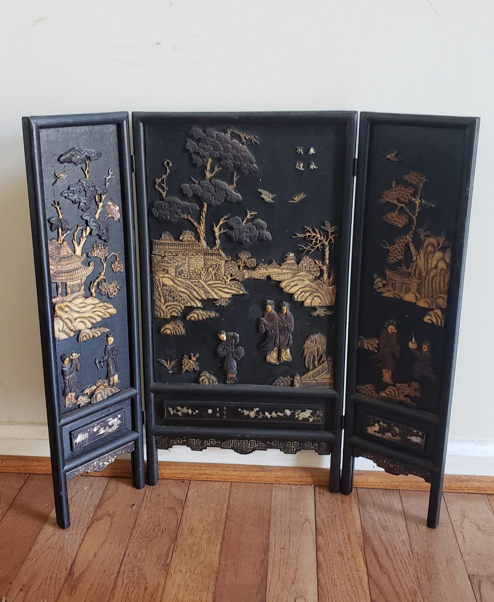 A Late 19th Century  Ming Style Carved, Ebonized and Giltwood Trifold Table Screen in great condition.