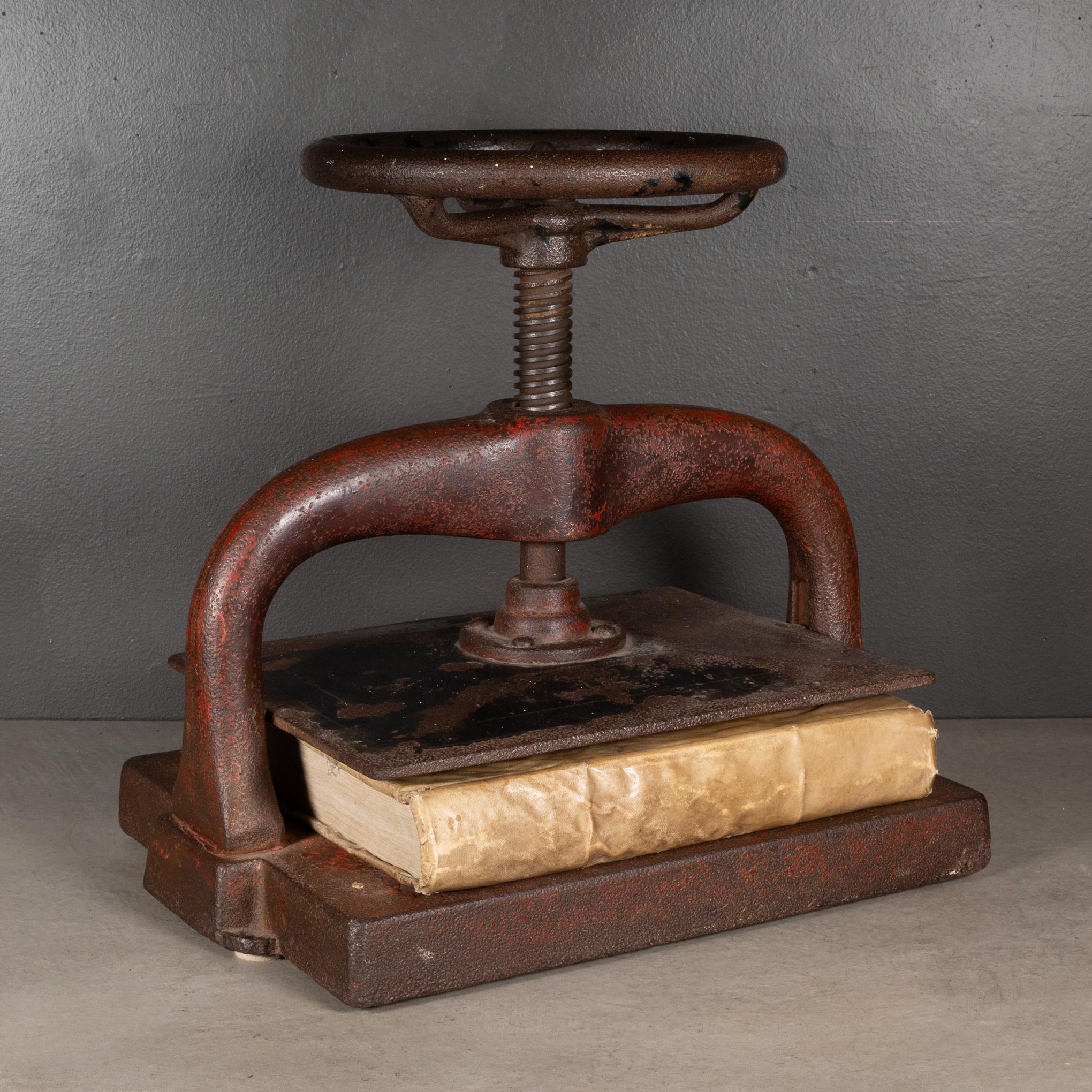 ABOUT

An antique cast iron wheel book binding press with original red paint. The handle works properly and moves up and down. 

    CREATOR Unknown. 
    DATE OF MANUFACTURE c.1890.
    MATERIALS AND TECHNIQUES Cast Iron.
    CONDITION Good. Wear
