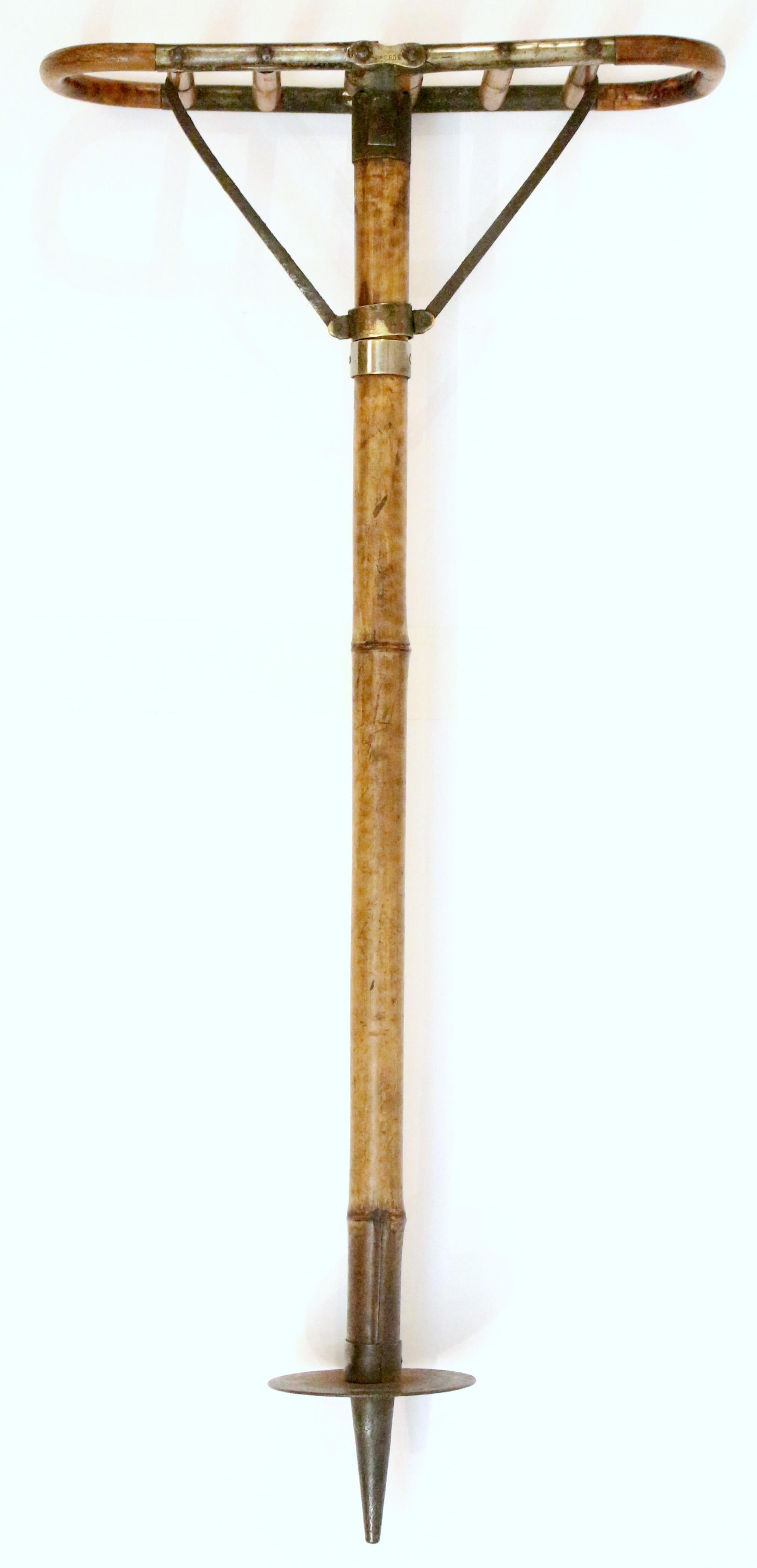 Late 19th century bamboo & brass sporting event or hunting walking stick with seat, English. Well figured bamboo. Good brass cuffs & supports. Iron shafts for seat support. Marked 