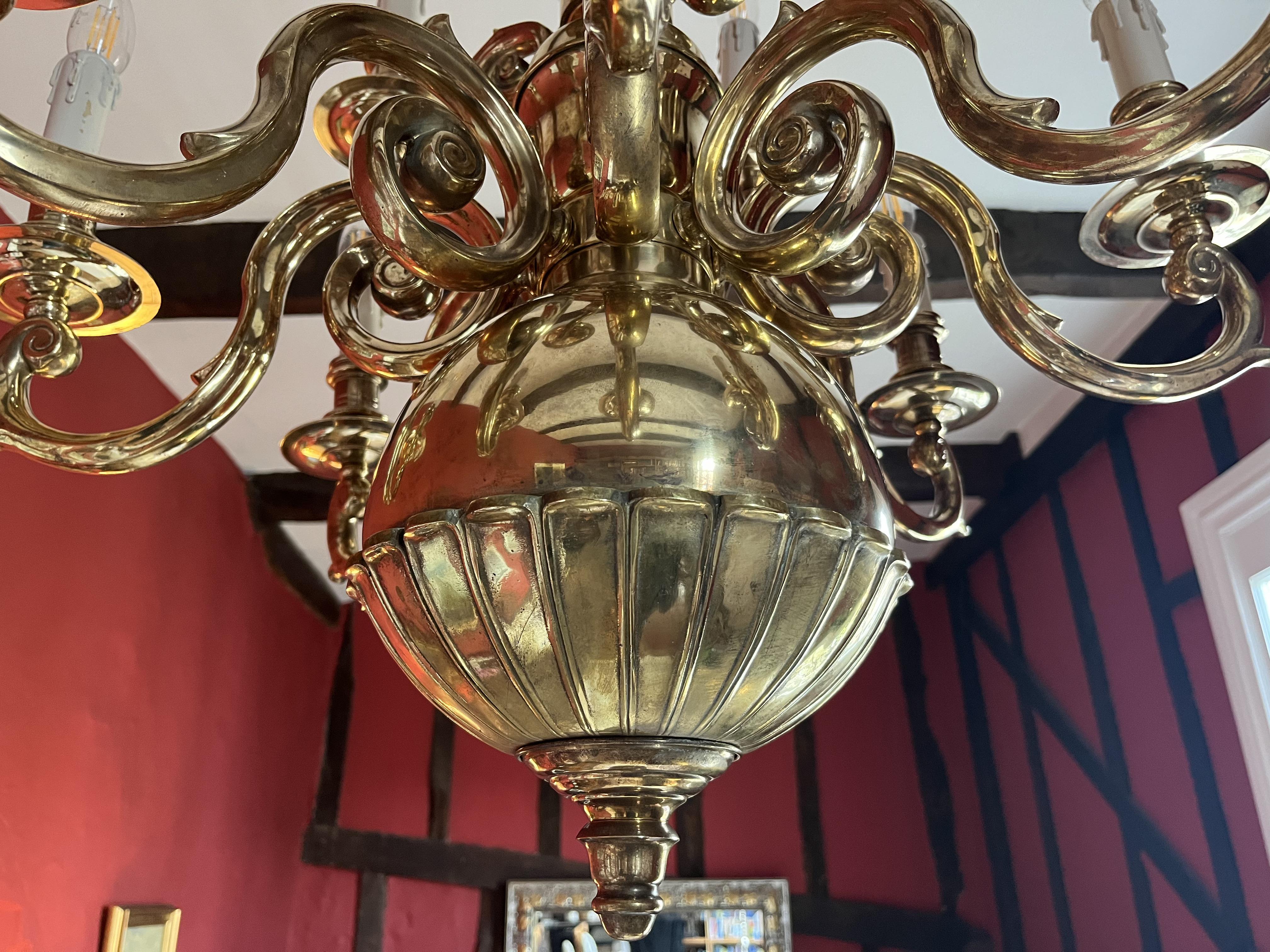 Late 19th Century 12 light Solid Brass Flemish style chandelier  In Good Condition For Sale In Southall, GB