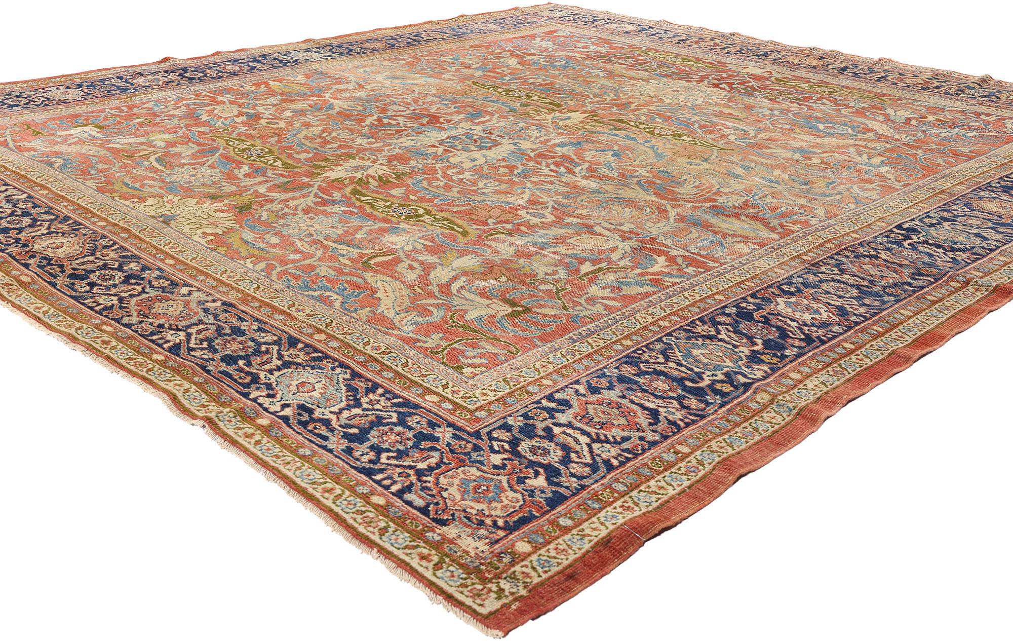 79127 Antique Persian Sultanabad Rug, 09'00 x 09'11. This hand-knotted wool distressed antique Persian Sultanabad rug from the late 19th century exudes laid-back luxury infused with historical significance. The richly striated rustic red field