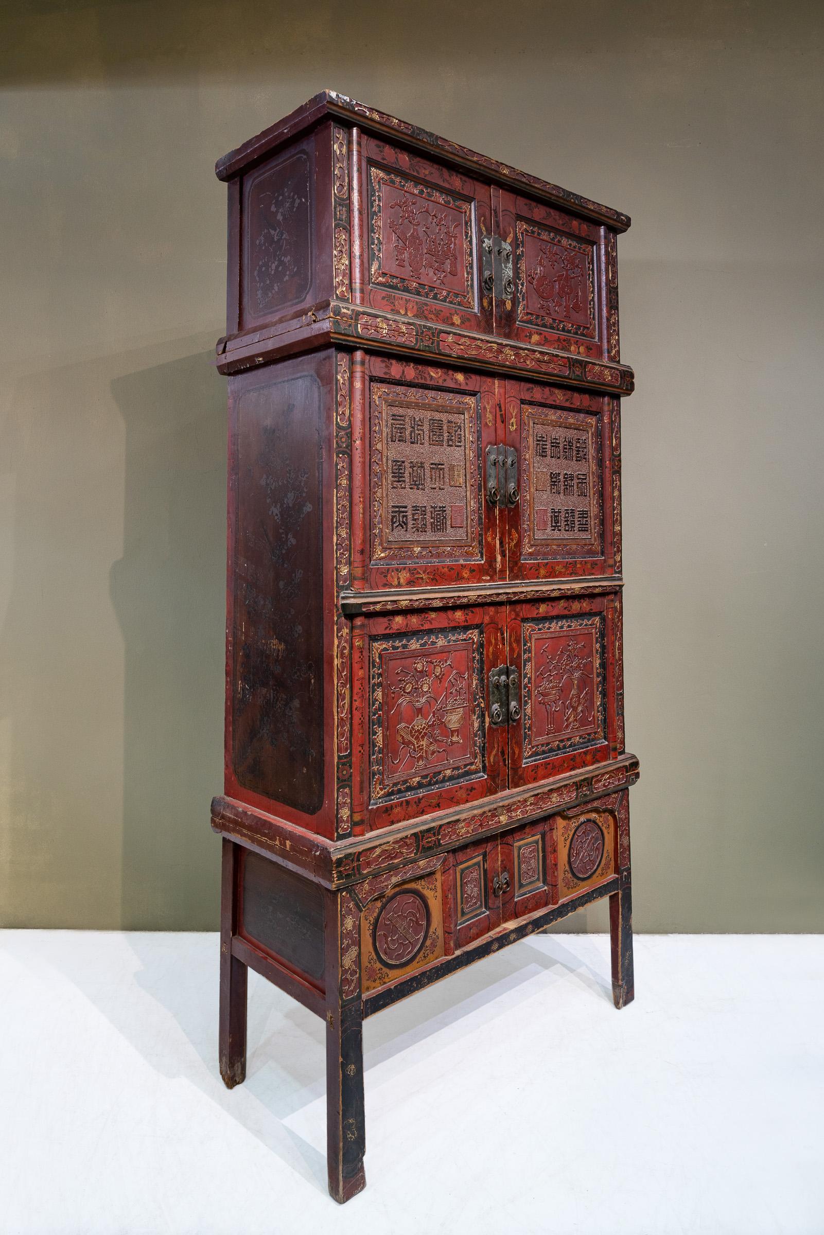 A late 19th century carved cabinet from Longyan city, Fujian province, China. The name Longyan (??) literally translates into 