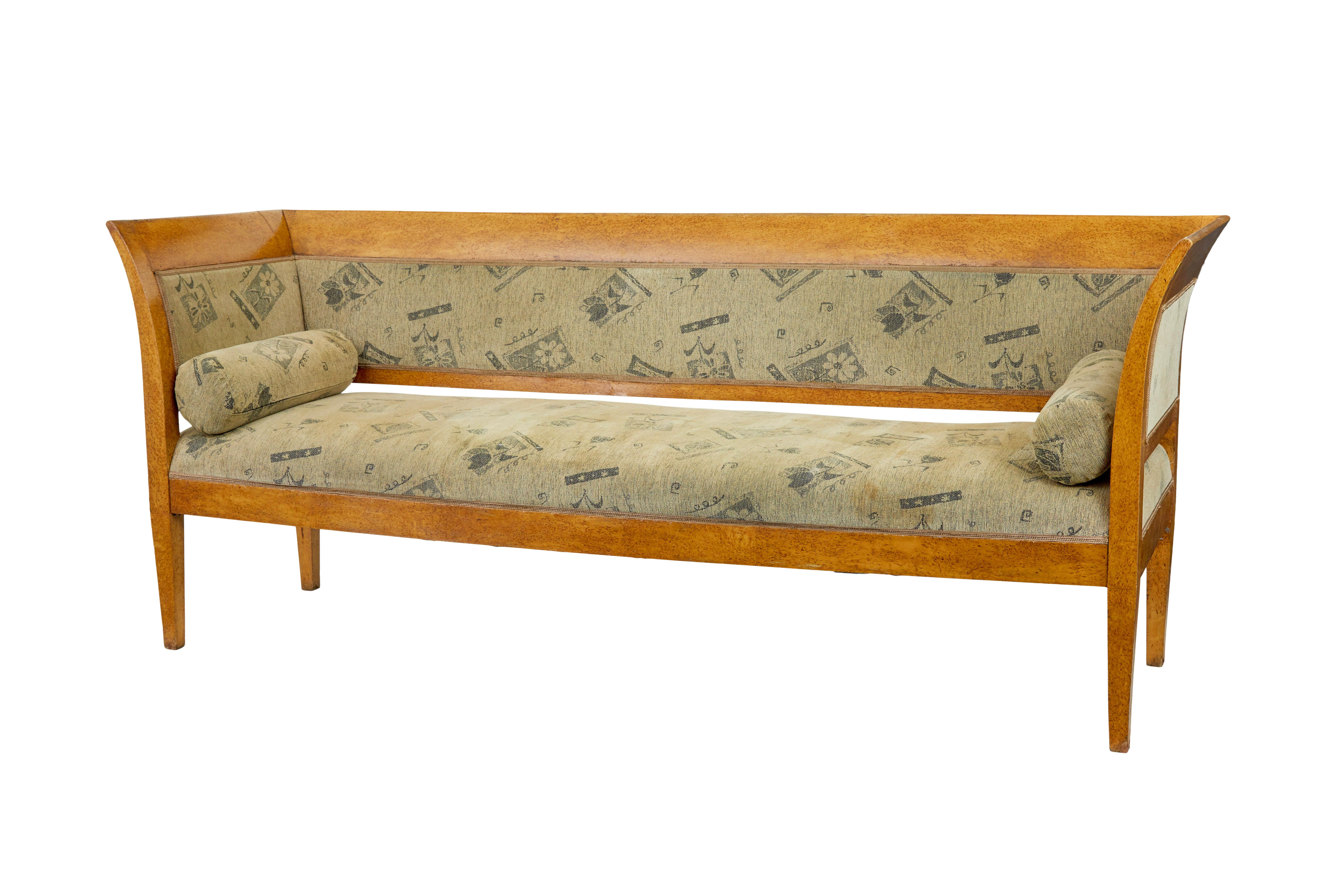 Late 19th century 7 piece burr birch living room suite circa 1890.

Set comprises of 1 sofa and 6 single dining chairs.  Stunning golden colour burr birch veneers. Upholstered in later fabric.

Set stands on tapered legs.

Some minor losses to