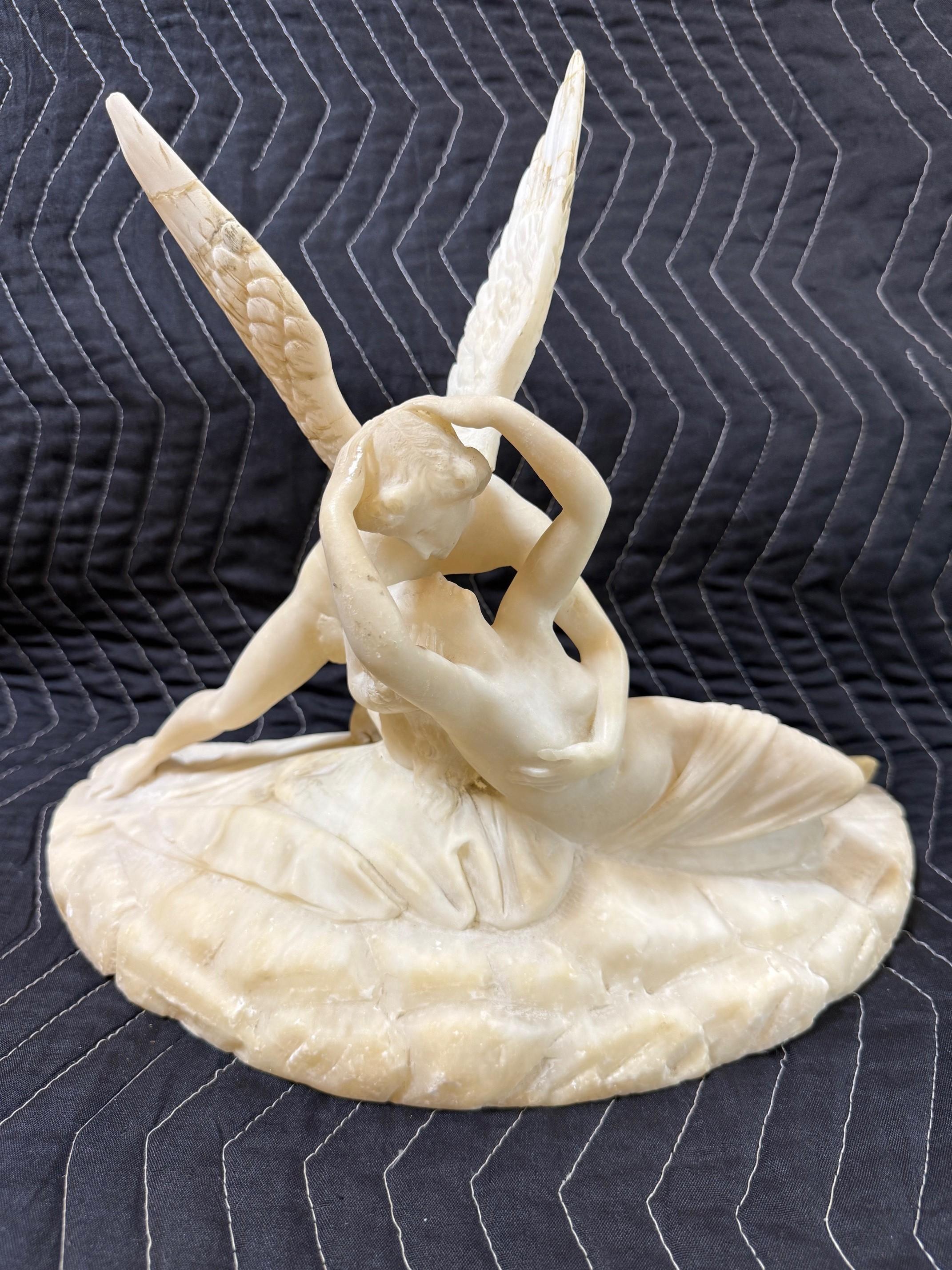 Late 19th Century alabaster sculpture Psyche Revived by Cupid's Kiss. The
sculpture depicts the mythological scene of Cupid (Psyche
Revived by Cupid's Kiss), a famous subject in Neoclassical art,
most notably by Antonio Canova. This theme,