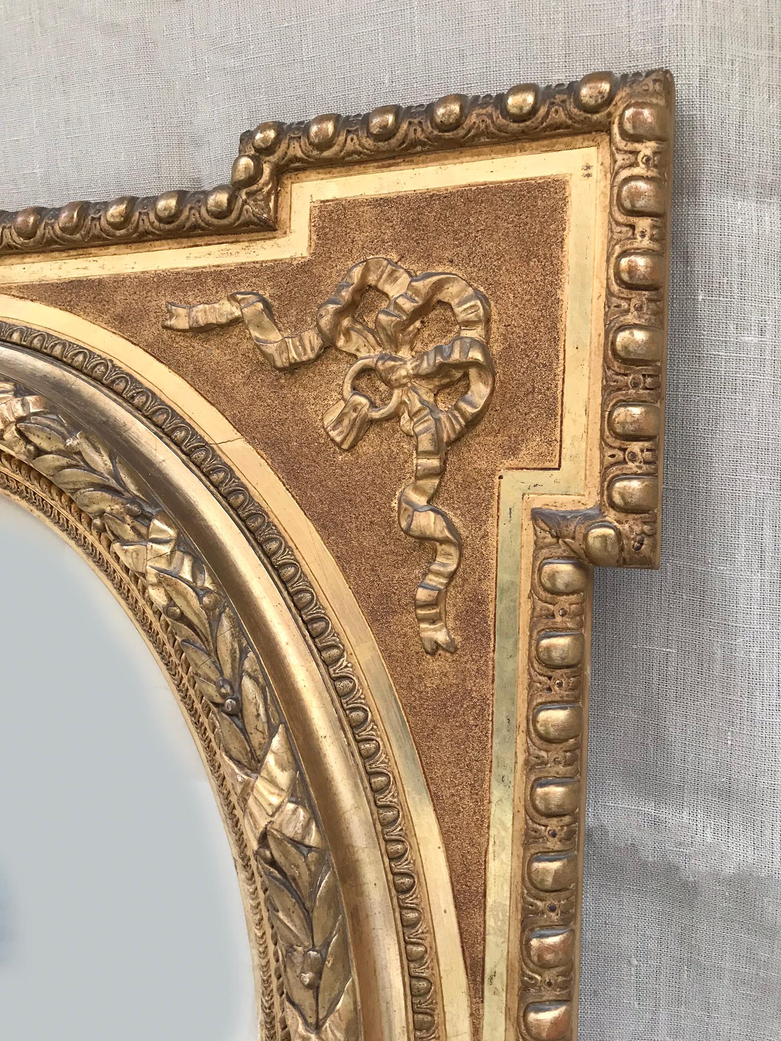 Alfonsino mirror carved in burnished gold leaf with some stucco embossed details.

It is a perfect mirror to decorate the walls of our home and give it a detail of grandeur and elegance.

 