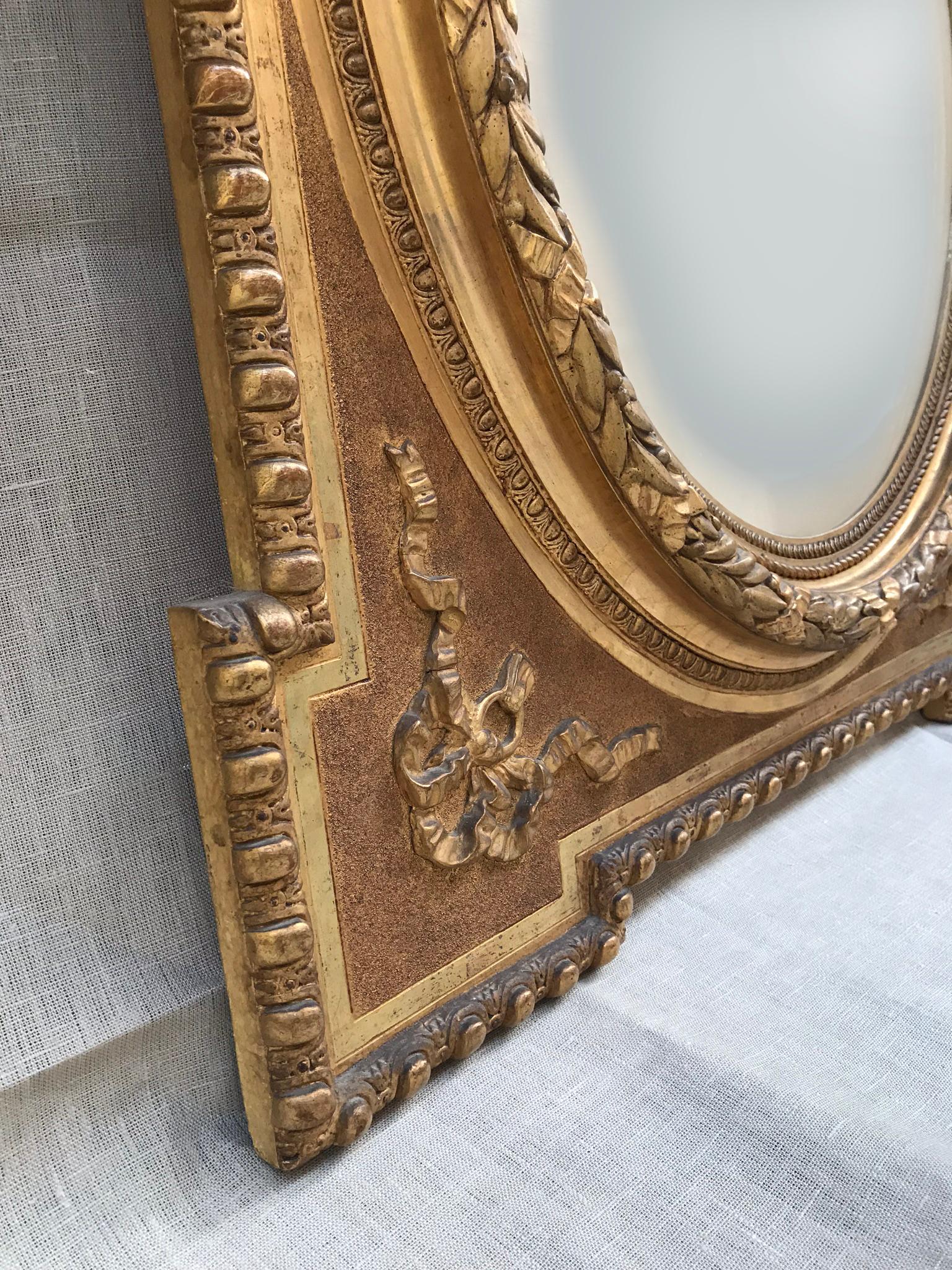 Spanish Late 19th Century Alfonsino Mirror in Burnished Gold Leaf with Stucco Embossed For Sale