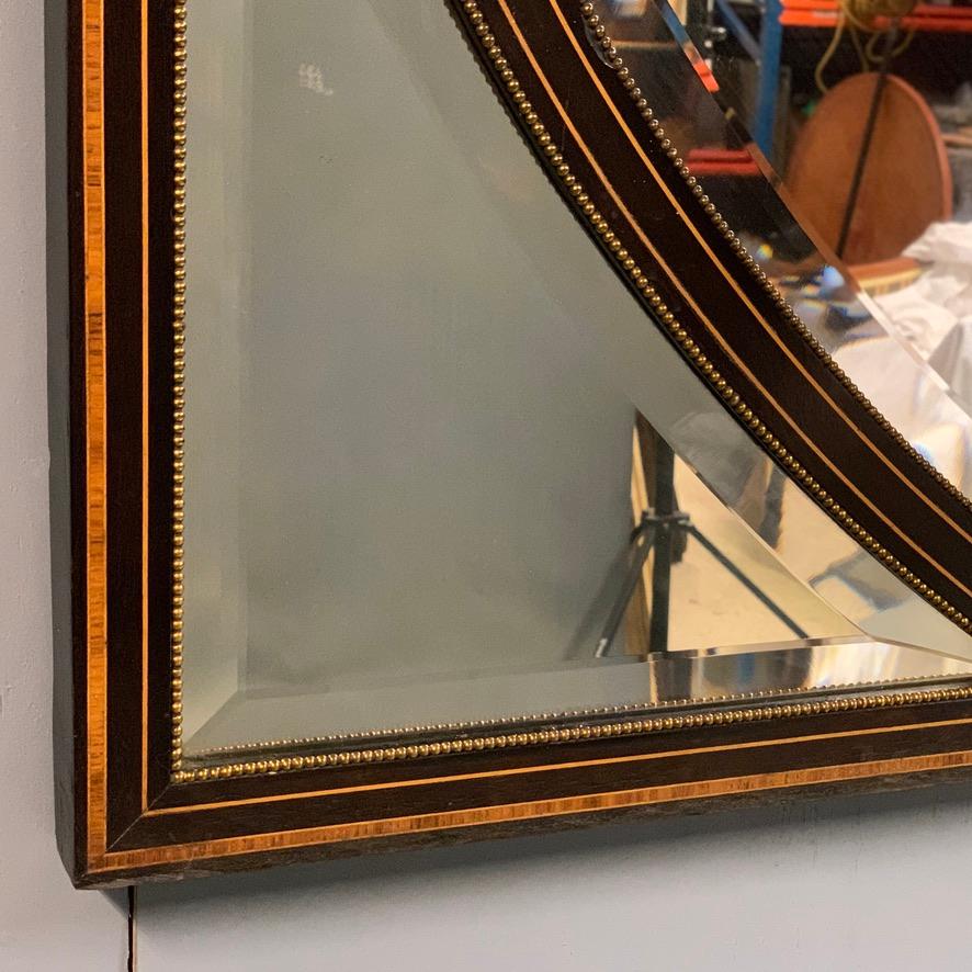 English Late 19th Century Amboyna and Ebonized Mirror with Beveled Glass For Sale