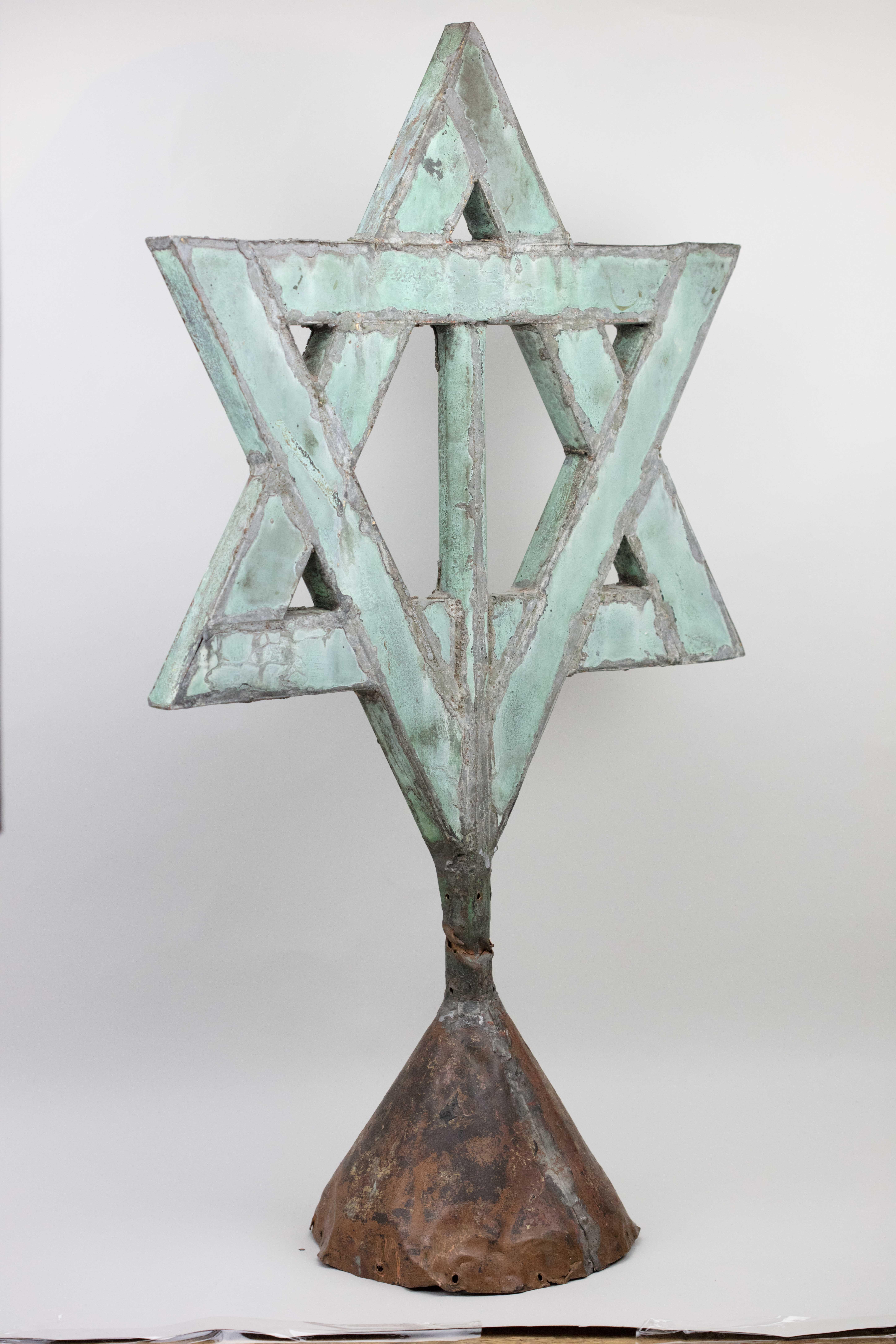 Handmade copper synagogue roof-top finial, USA, circa 1880.
Folk Art, Americana, New England Hammered and soldered copper architectural finial in form of a Star of David.
Bearing beautiful hundred years green patina.

Every item in Menorah Galleries