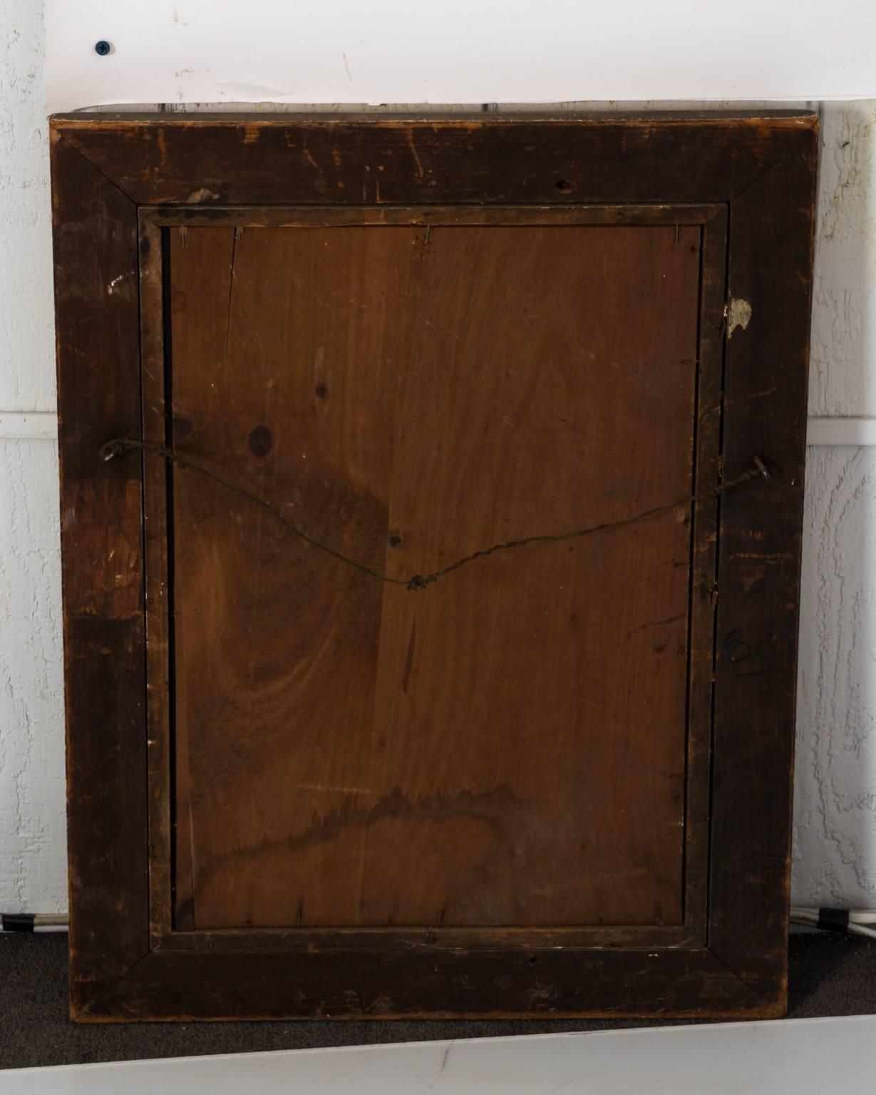 American mirror in a gilded frame with carved sheaves of wheat and beaded trim, circa late 19th century. This piece also has its original mirror plate.