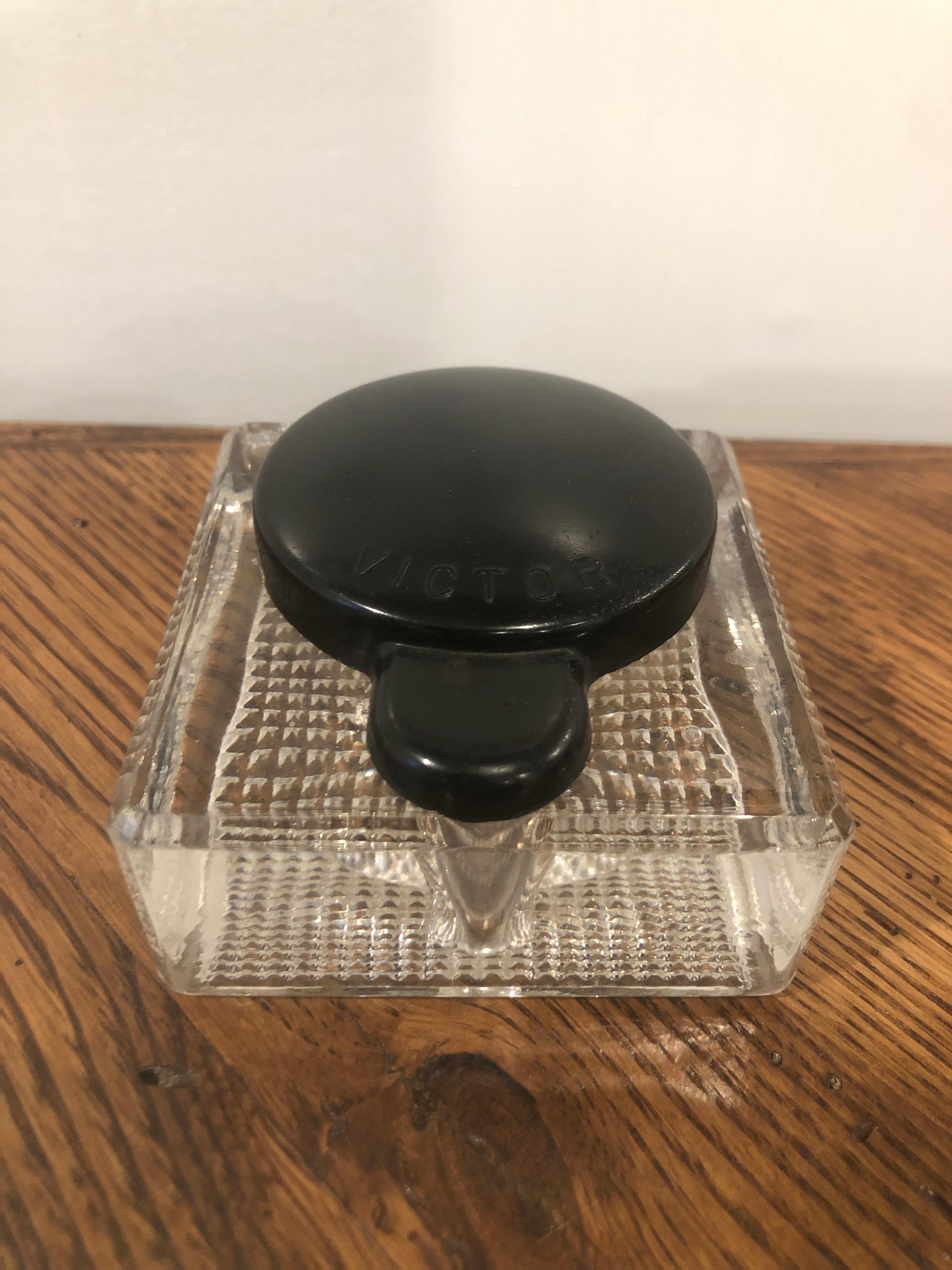 American pressed glass inkwell square base with a black top rounded edges stamped VICTOR. This inkwell has a great look and unusual shape circa 1880.