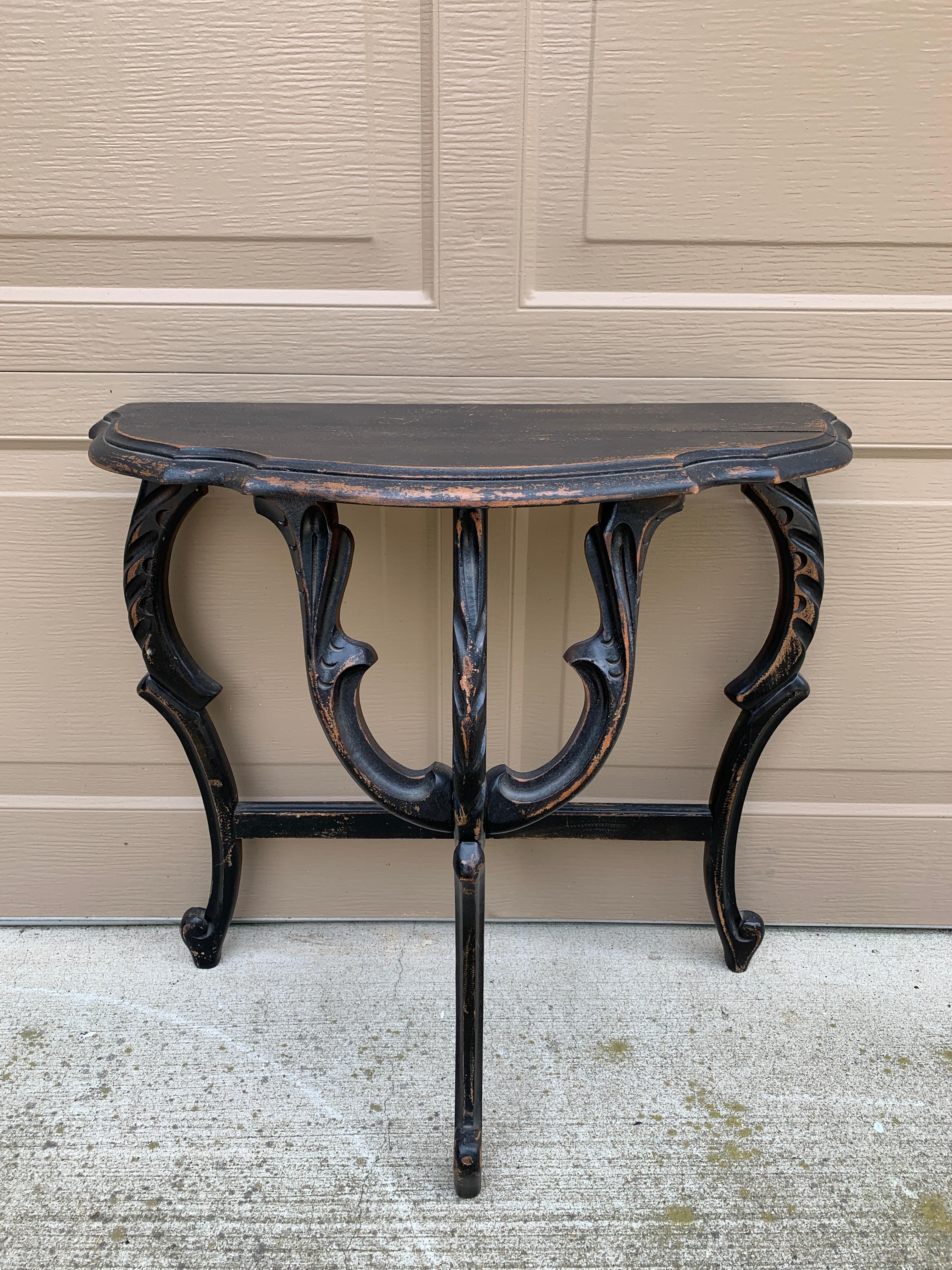 A gorgeous Victorian black painted carved walnut side table 

USA, Circa late 19th century

Measures: 24