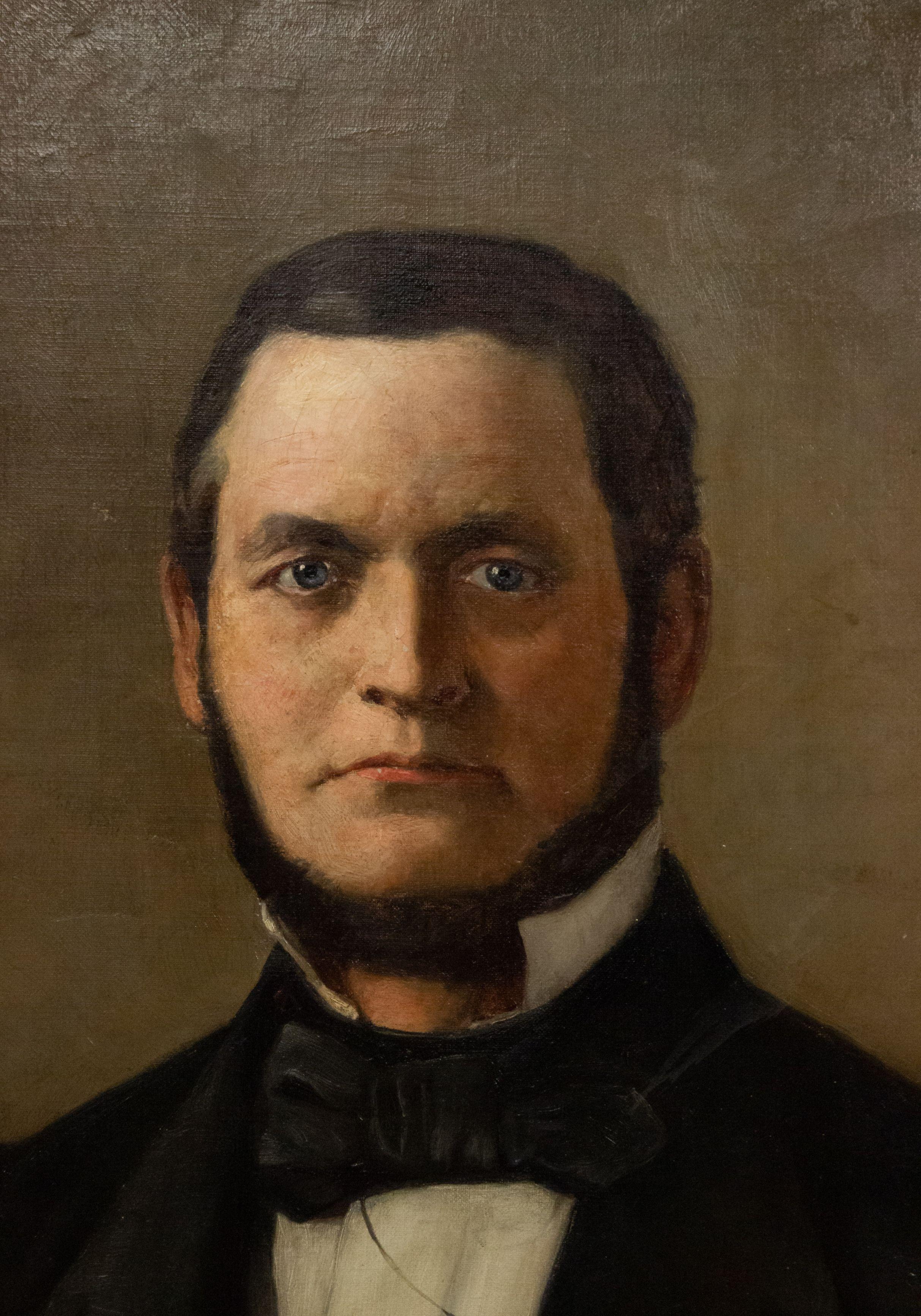 19th century American Victorian gilt framed oil painting portrait of man with beard and black tie.
 