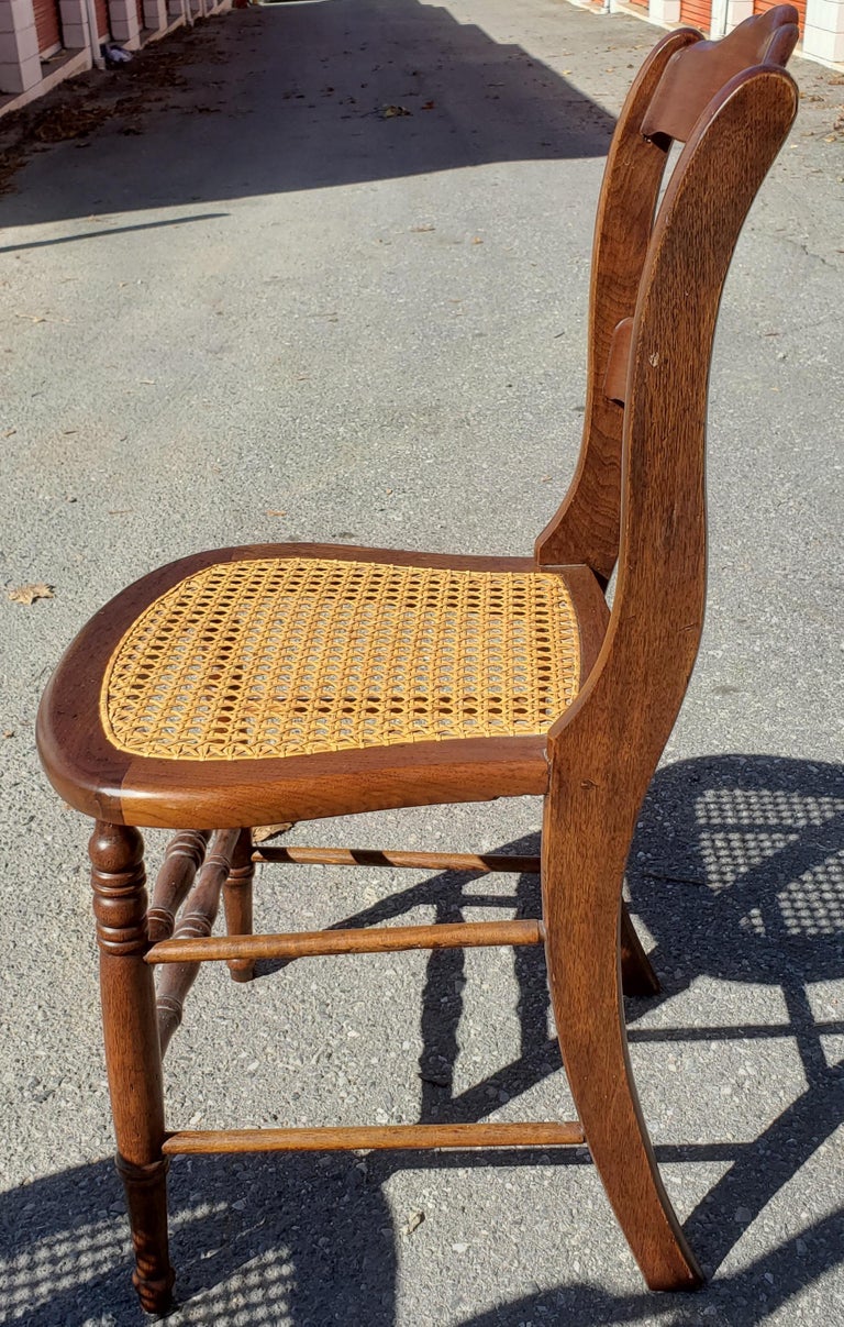 Late 19th Century Americana Cane Seat and Ladder Back Chairs, a Pair at