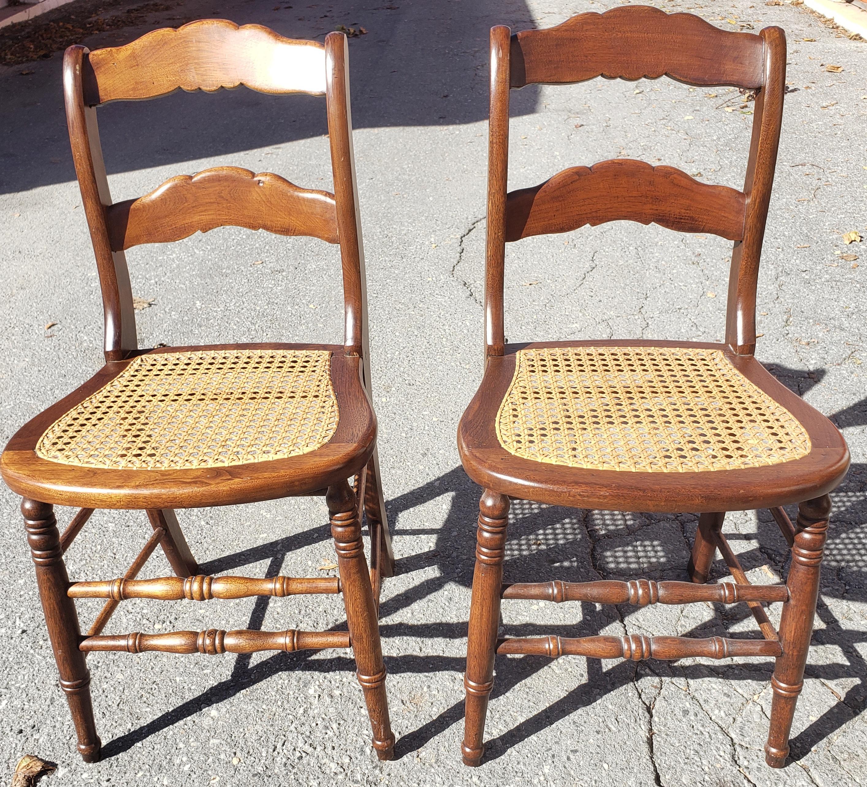 Caning Late 19th Century Americana Cane Seat and Ladder Back Chairs, a Pair