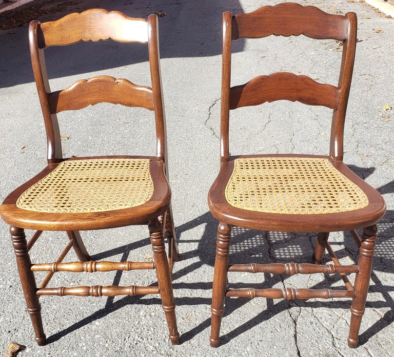 Late 19th Century Americana Cane Seat and Ladder Back Chairs, a Pair at