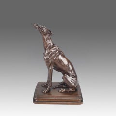 Bronce de temática animal de finales del siglo XIX titulado «Lévrier Assis», de Alfred Dubucand