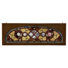 Transom antico ad arco in vetro colorato della fine del XIX secolo in una nuova cornice in Wood
